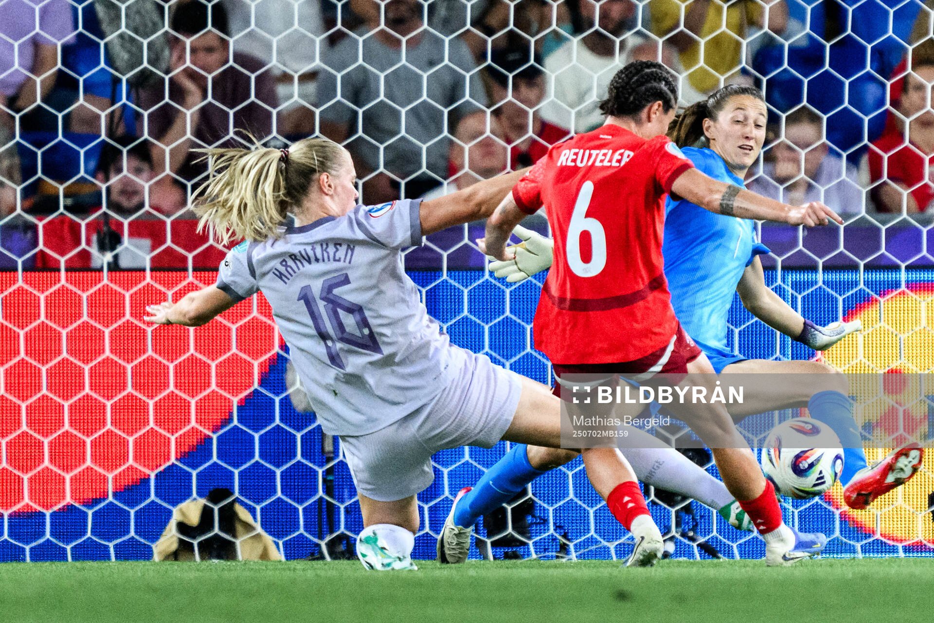 Mathilde Harviken and goalkeeper Cecilie Fiskerstrand of