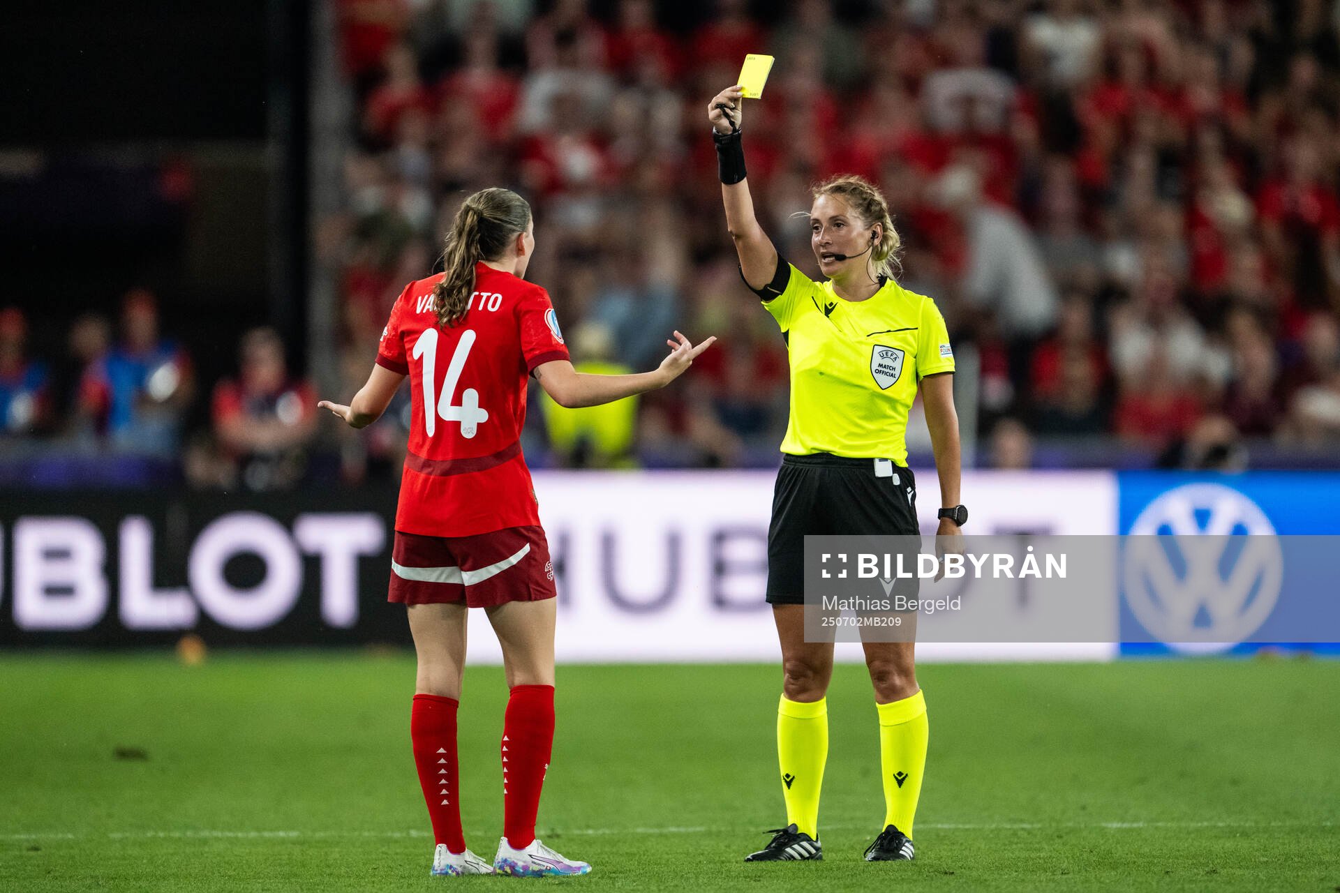 Smilla Vallotto of Switzerland receives a yellow card from