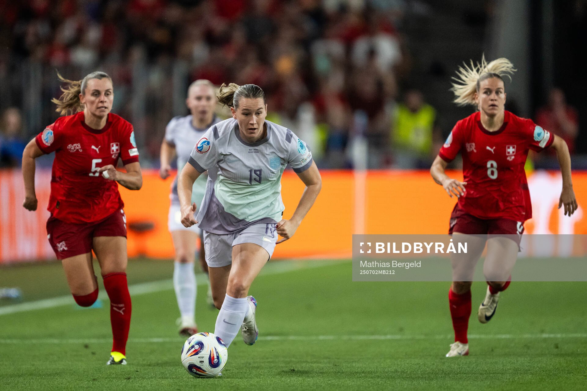 Noelle Maritz and Nadine Riesen of Switzerland chase