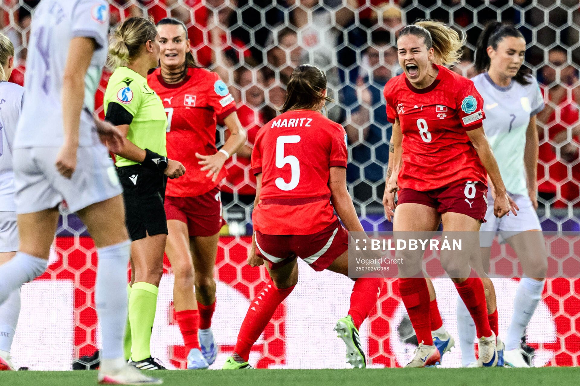 Nadine Riesen of Switzerland celebrates scoring 1-0