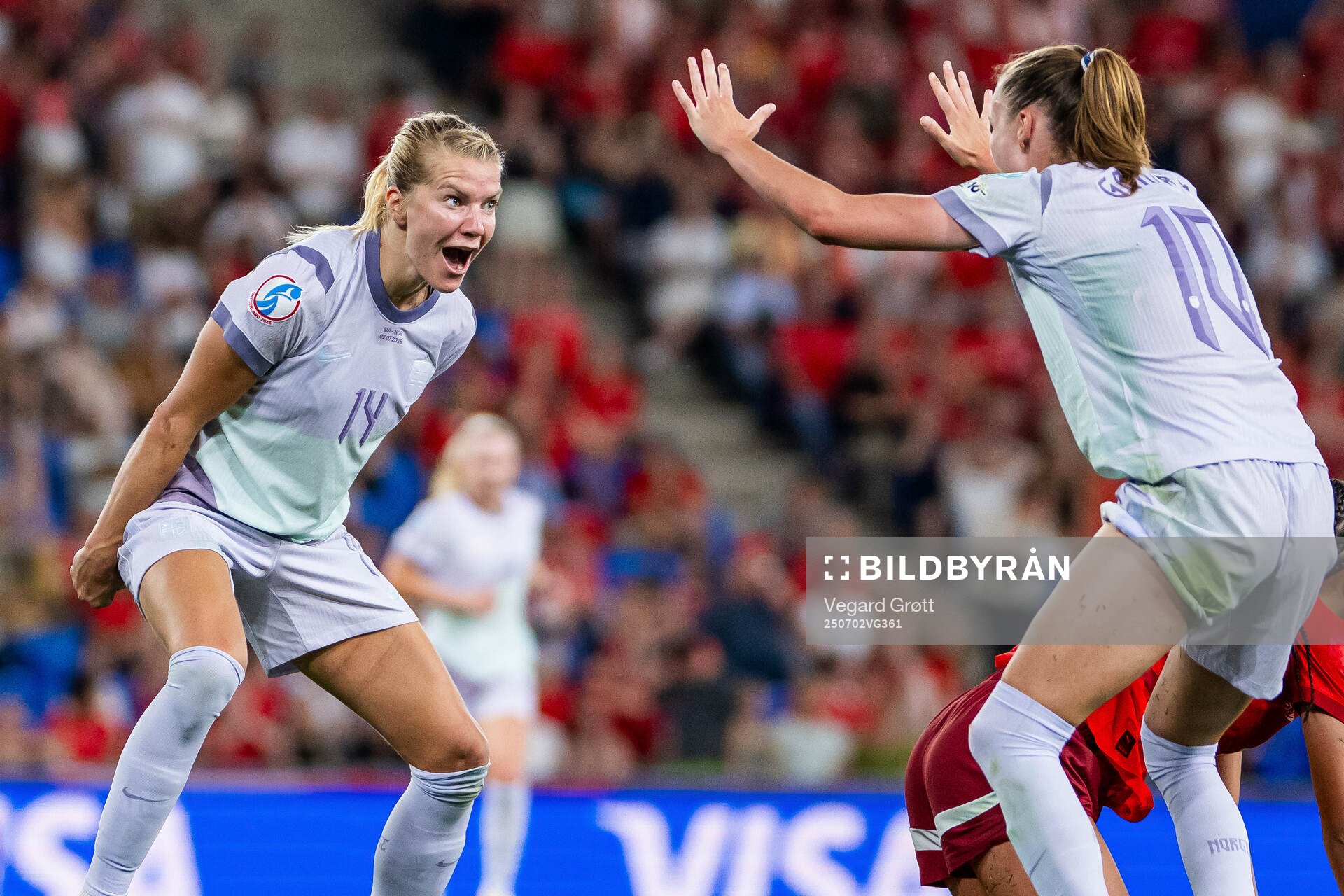 Ada Hegerberg and Caroline Graham Hansen of Norway celebrate