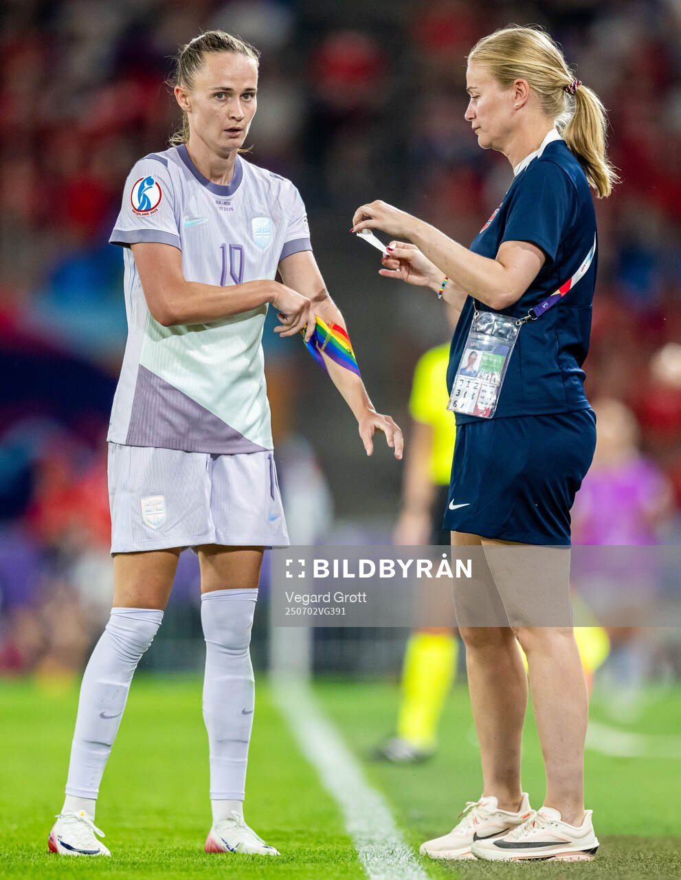 Caroline Graham Hansen of Norway gets help with the
