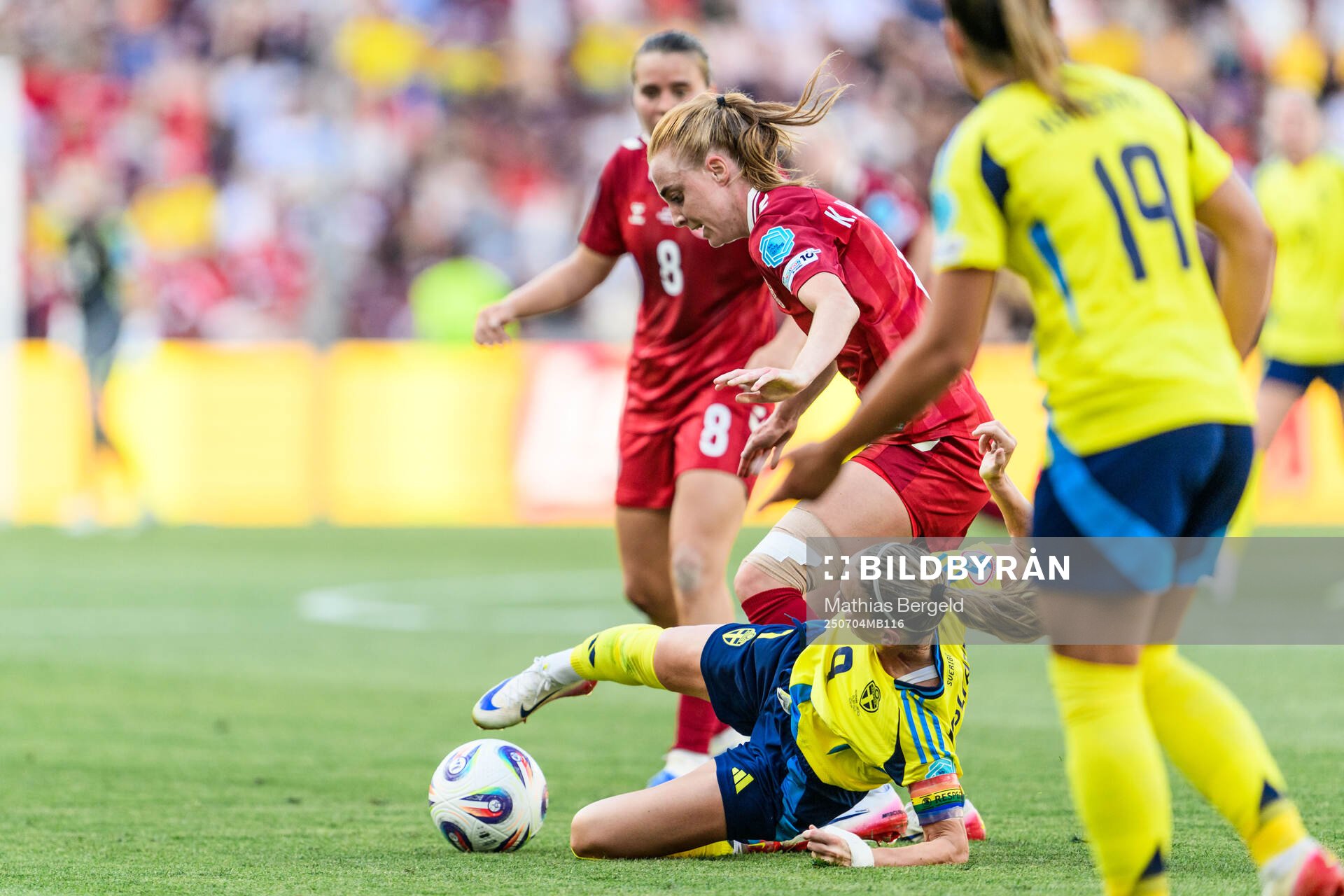 Karen Holmgaard of Denmark and Kosovare Asllani of Sweden
