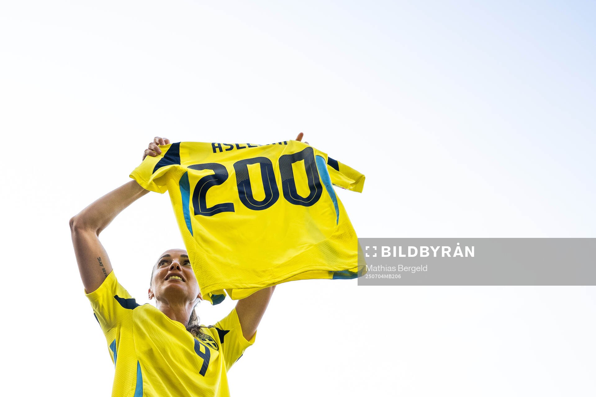 Kosovare Asllani of Sweden celebrates with a shirt marking