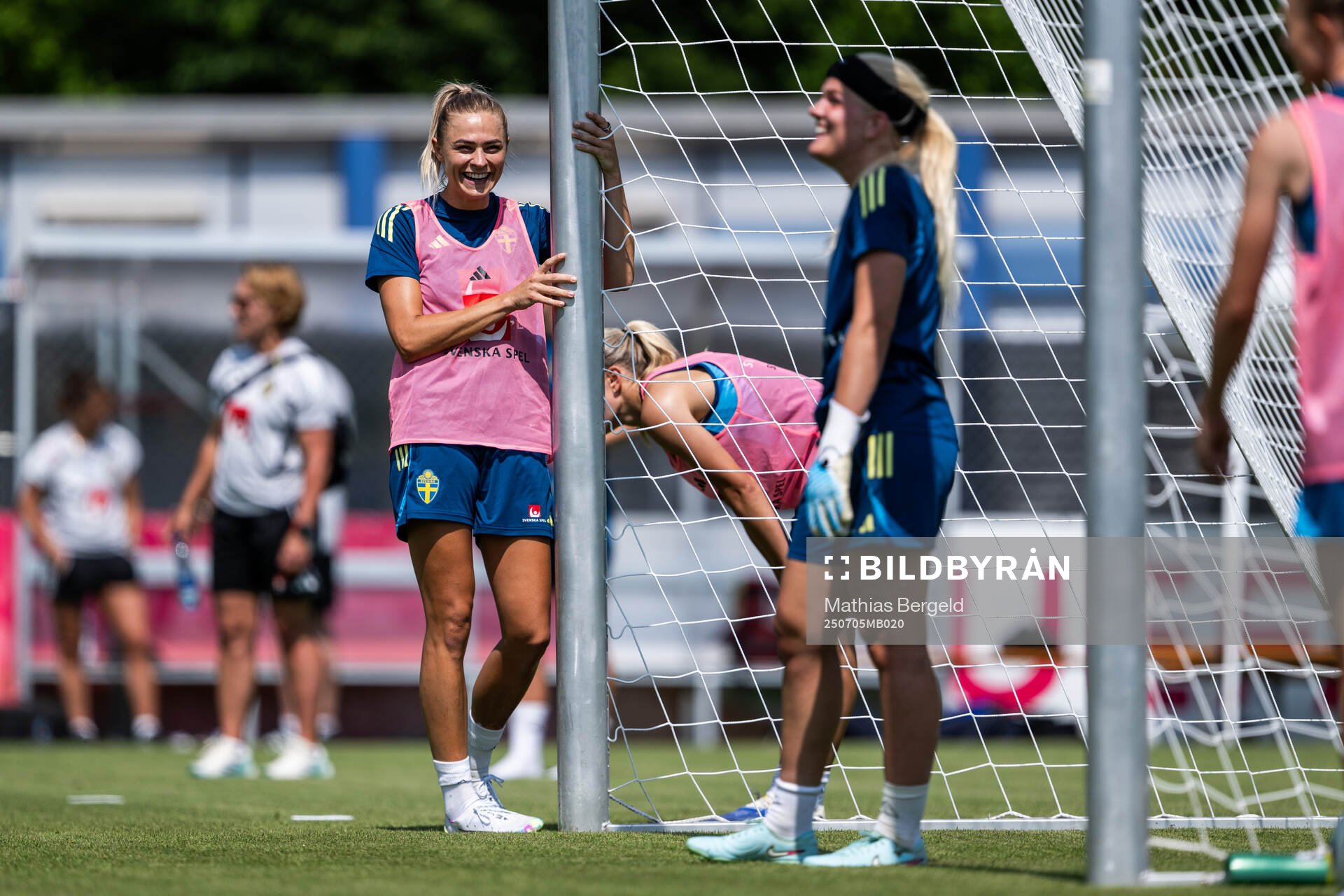 Fridolina Rolfö and goalkeeper Emma Holmgren of the