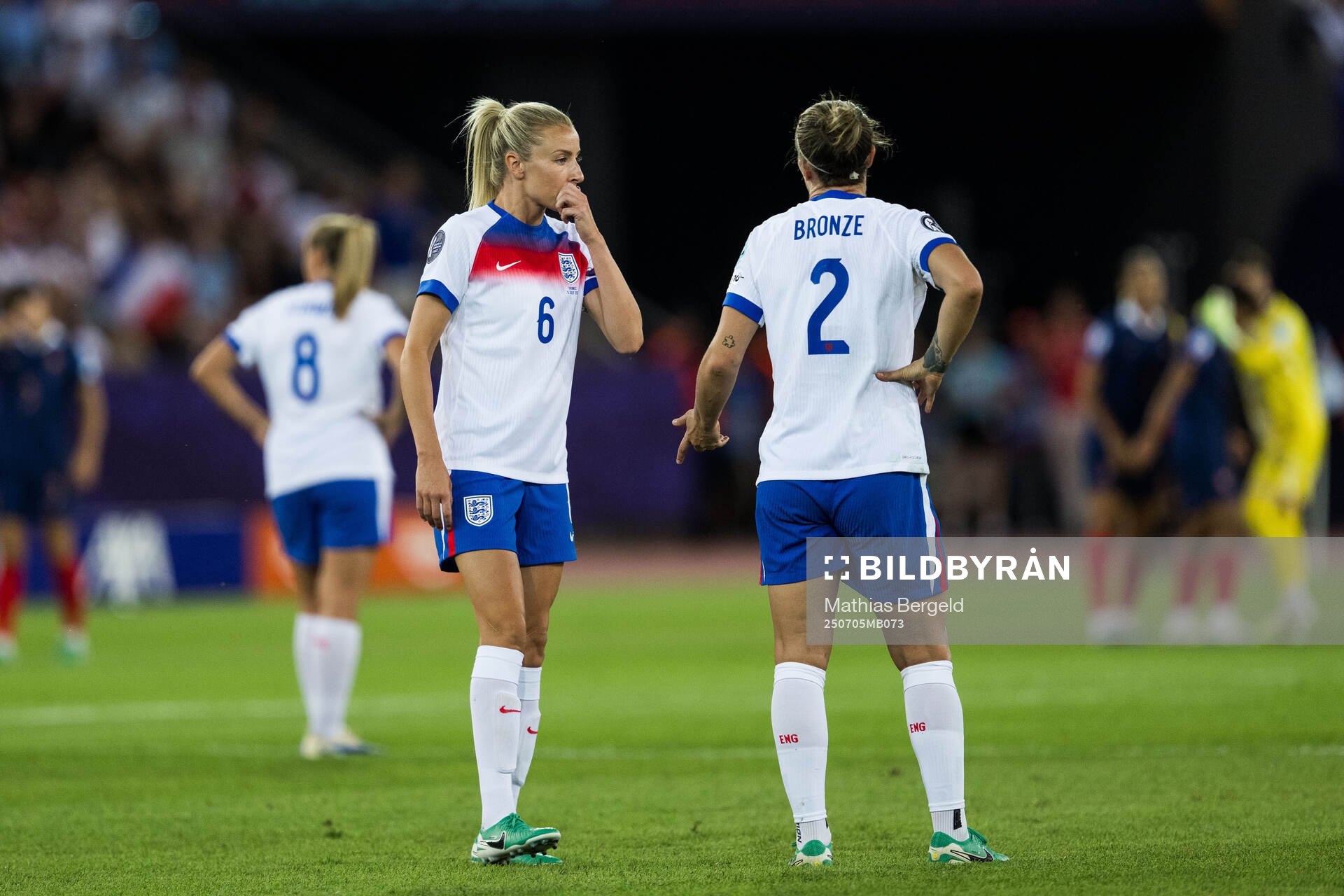 Leah Williamson and Lucy Bronze of England looks dejected