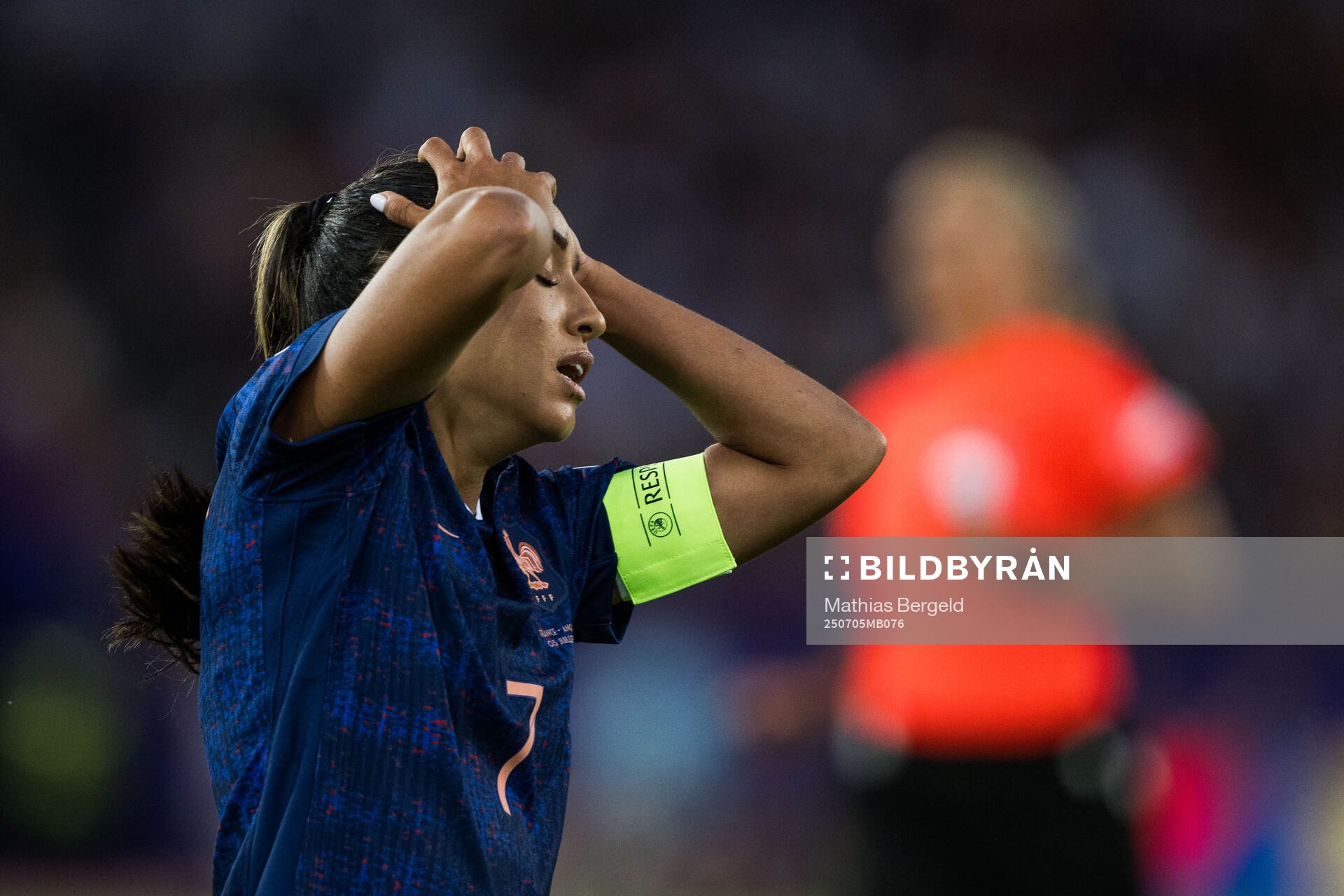 Sakina Karchaoui of France looks dejected