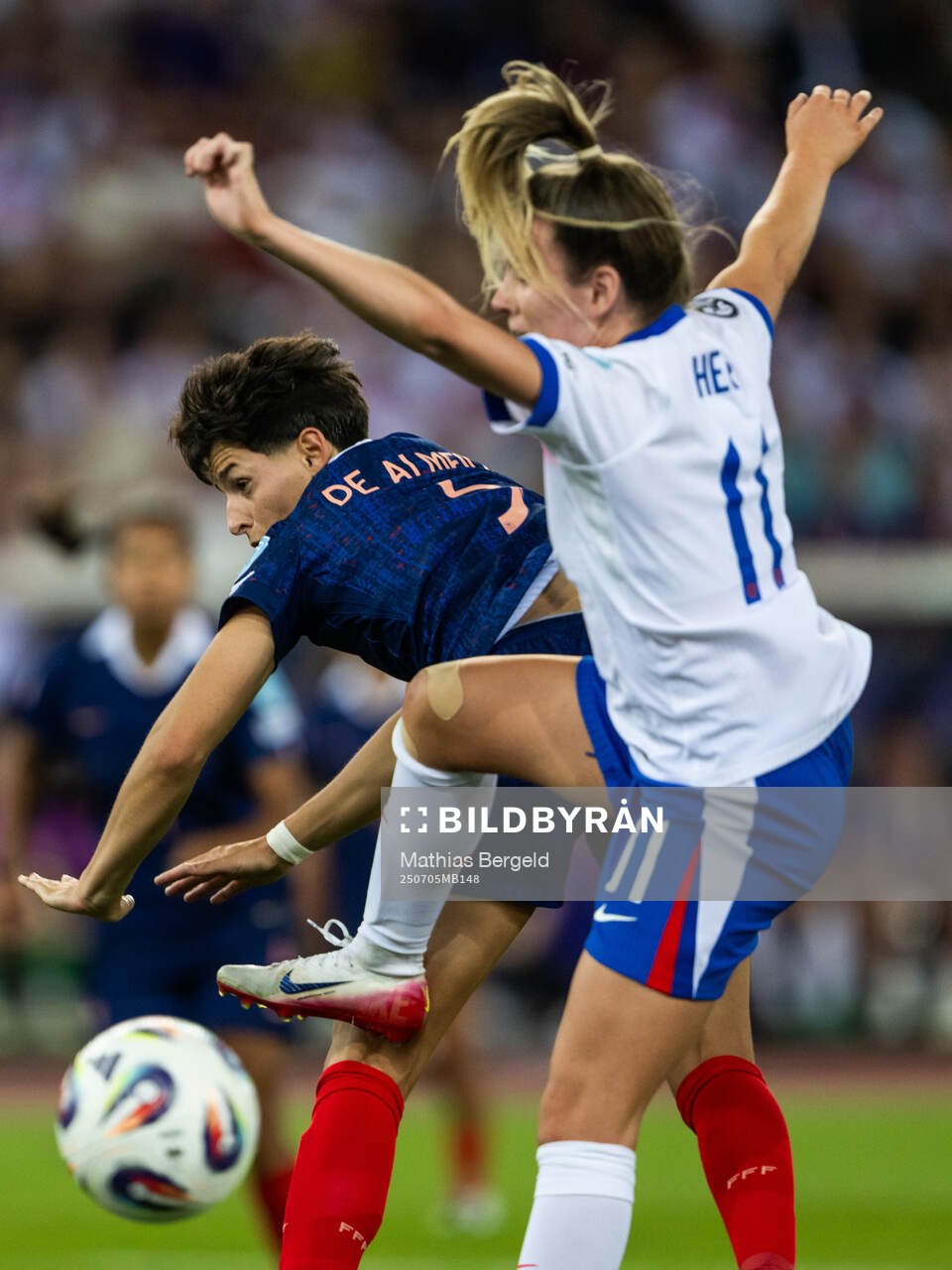 Elisa De Almeida of France and Lauren Hemp of England