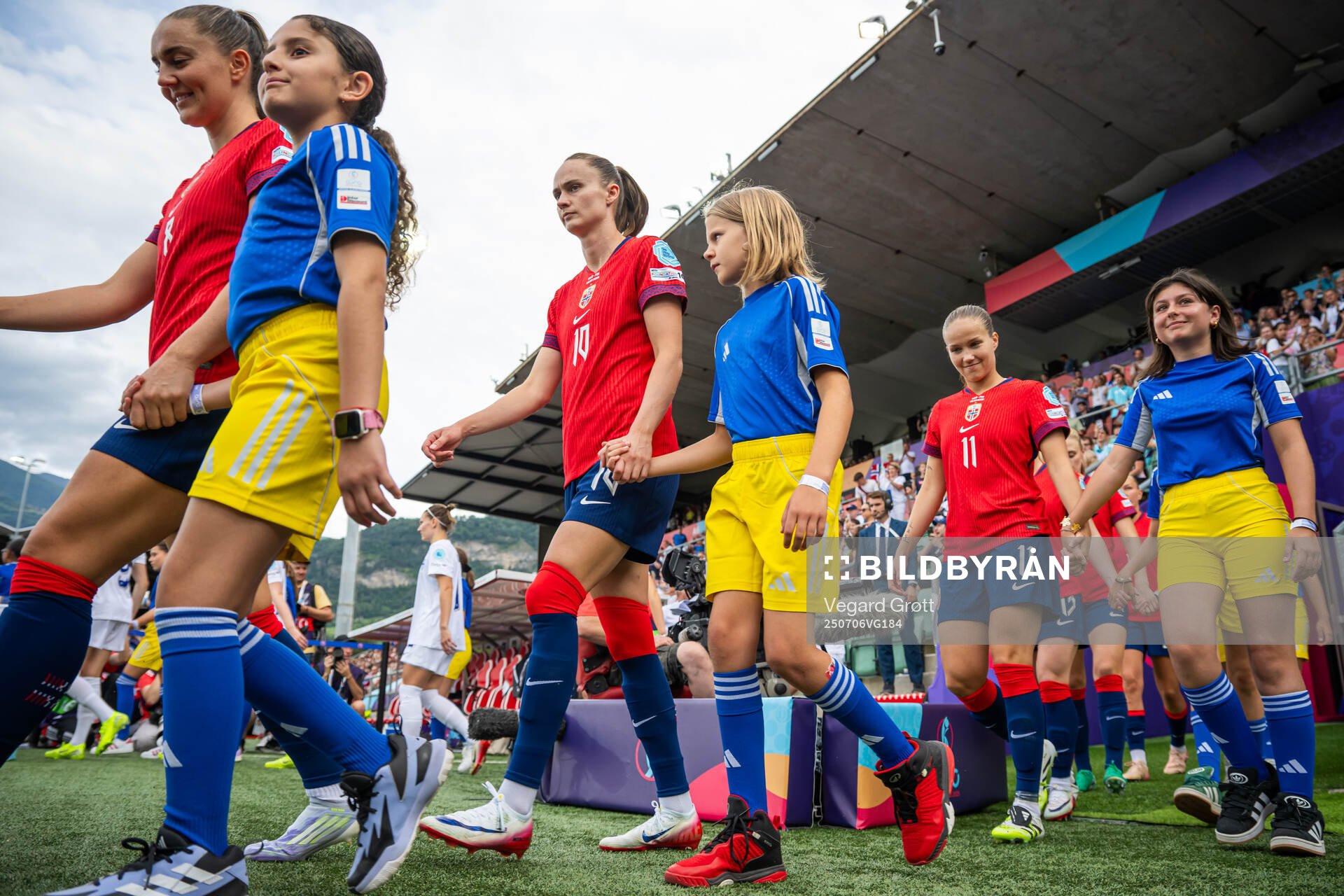 Caroline Graham Hansen and Guro Reiten of Norway enter the