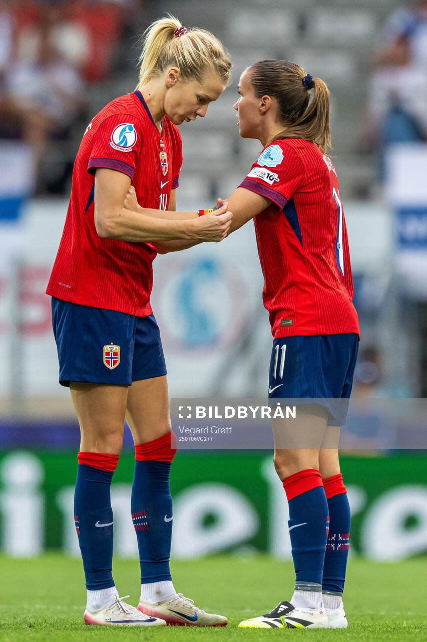 Ada Hegerberg of Norway gives the captains’ armband to