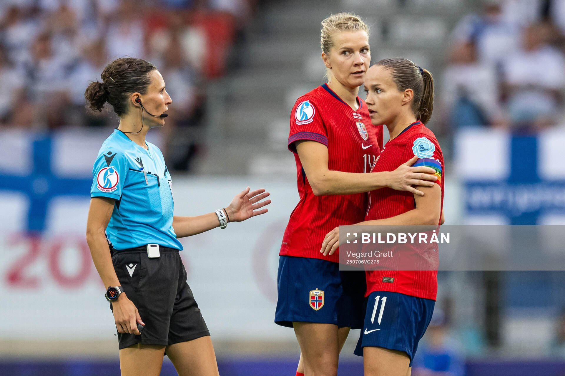 Referee Silvia Gasperotti, Ada Hegerberg of Norway and Guro