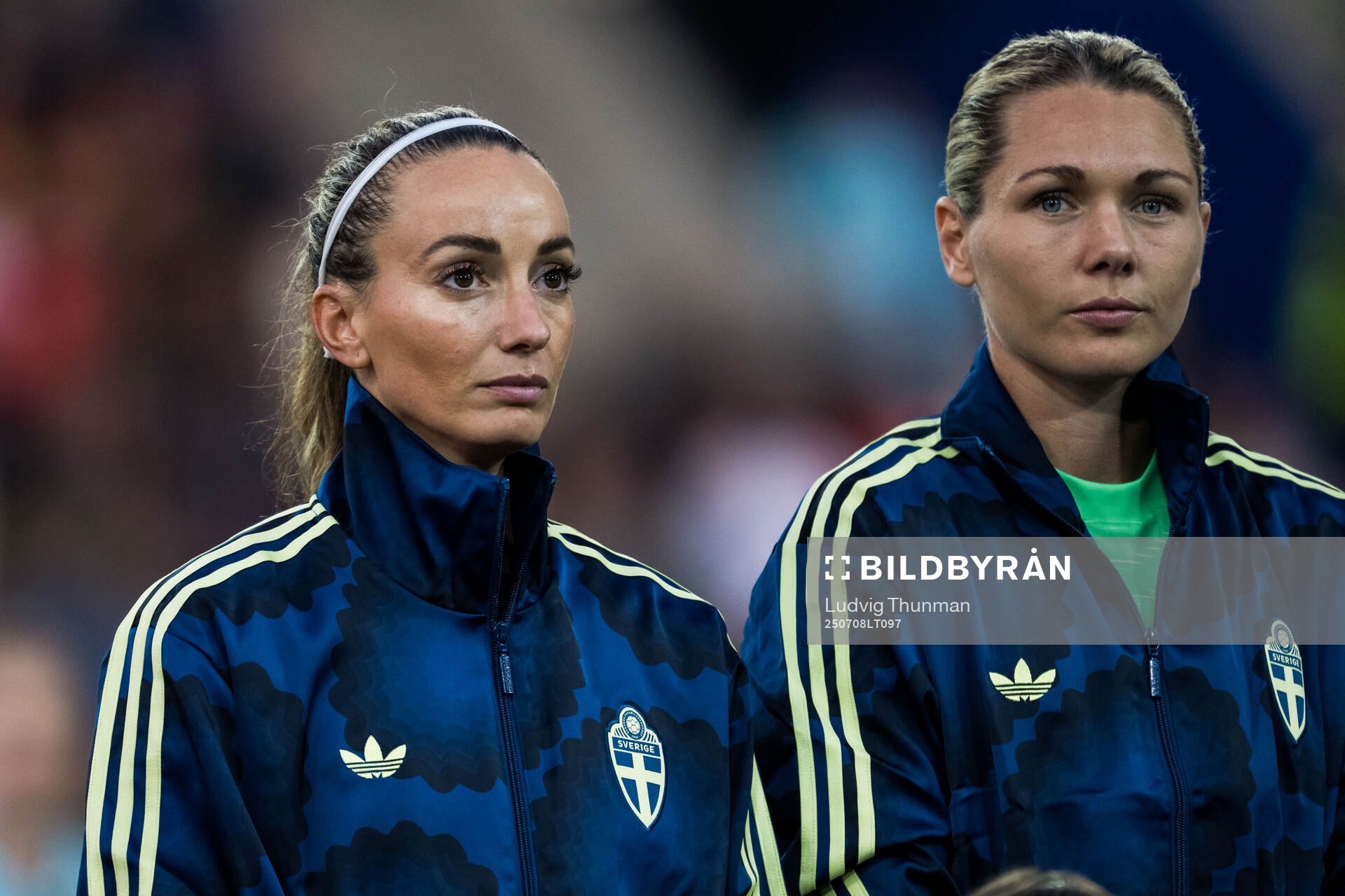 Kosovare Asllani and goalkeeper Jennifer Falk of Sweden