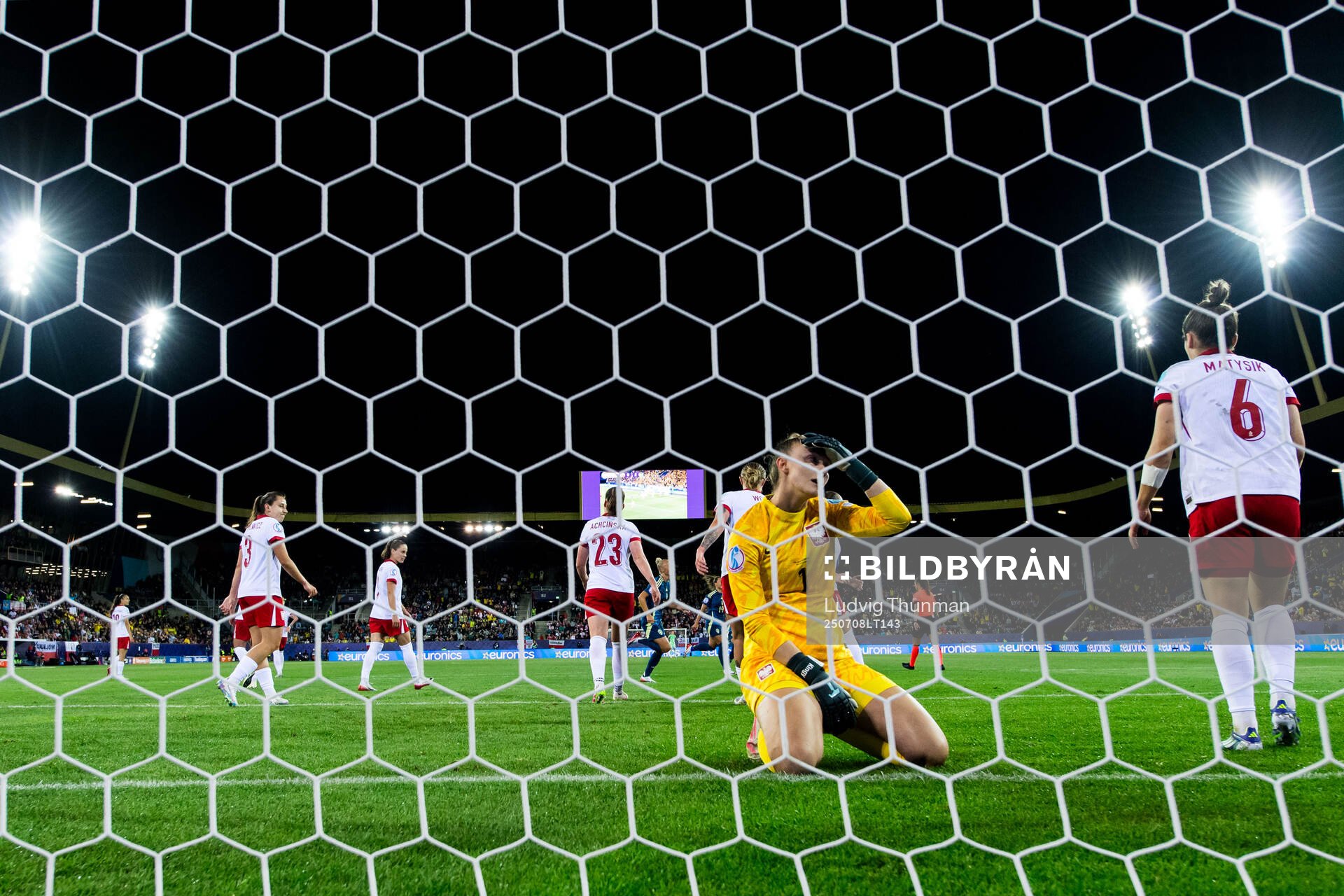 Goalkeeper Kinga Szemik of Poland looks dejected