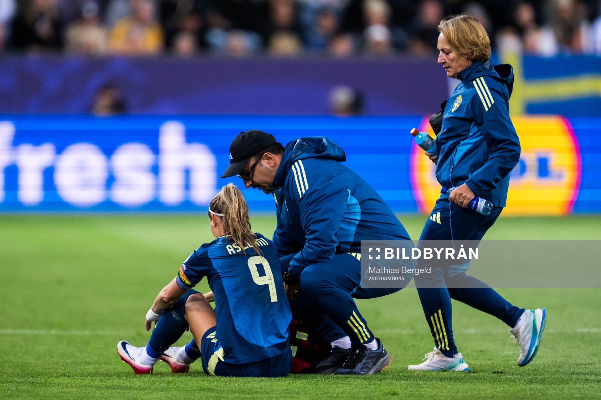 Kosovare Asllani of Sweden receives medical treatment