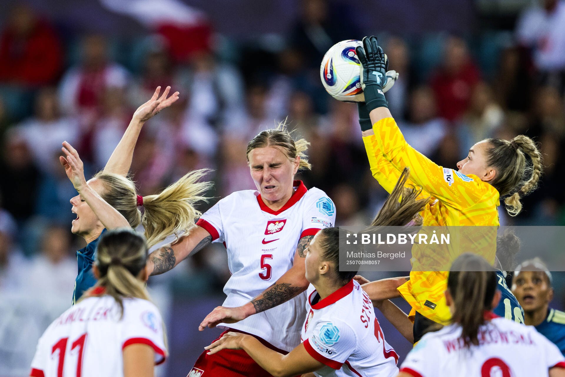Amanda Ilestedt of Sweden against Oliwia Wos and goalkeeper