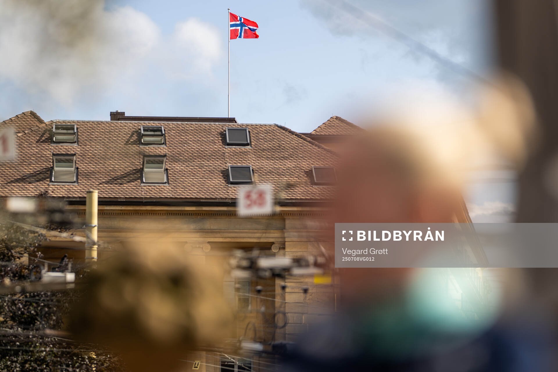 The Norwegian flag is seen at the top of Hotel Beau-Rivage