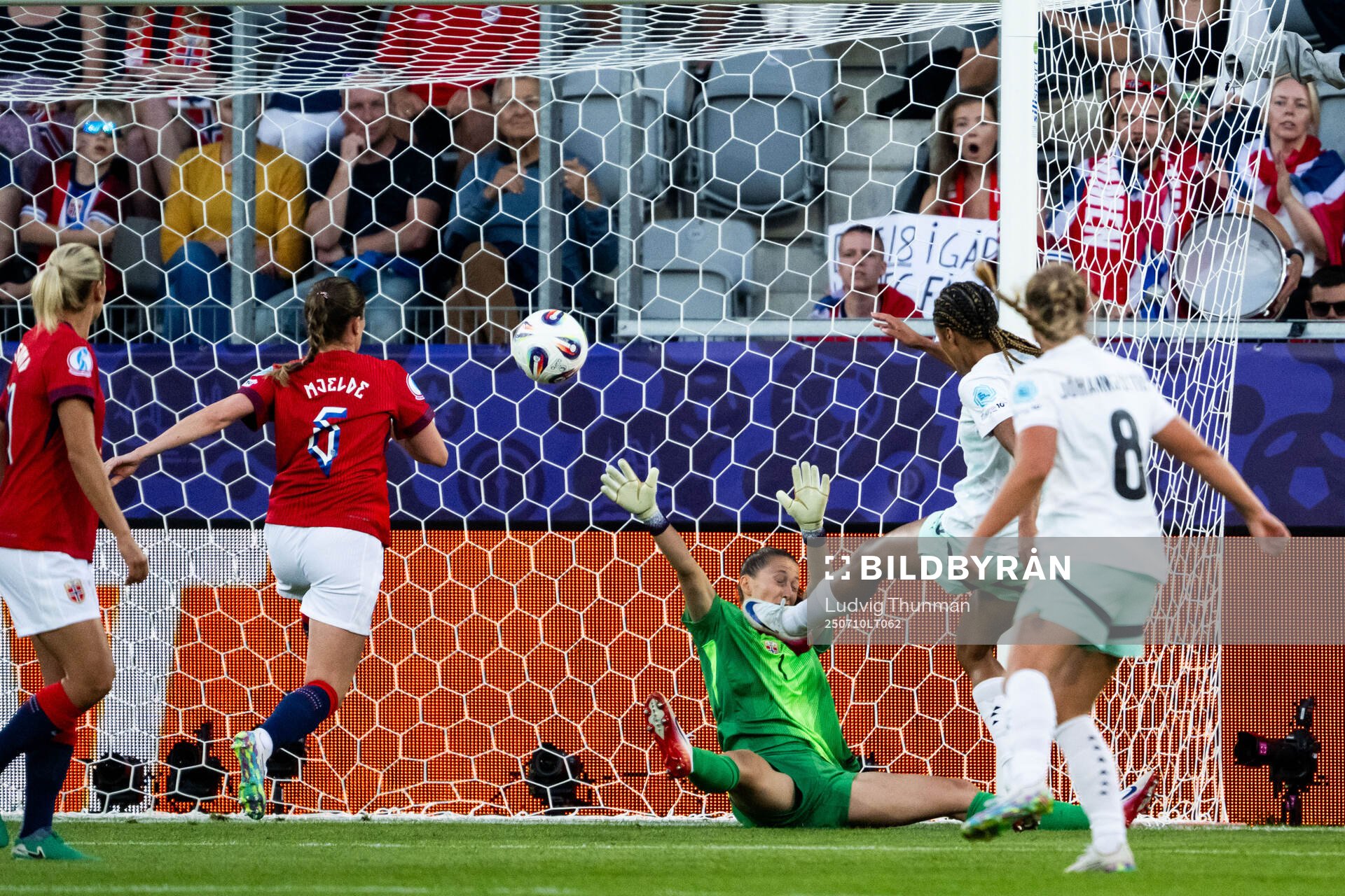 Sveindis Jonsdottir of Iceland scores behind goalkeeper