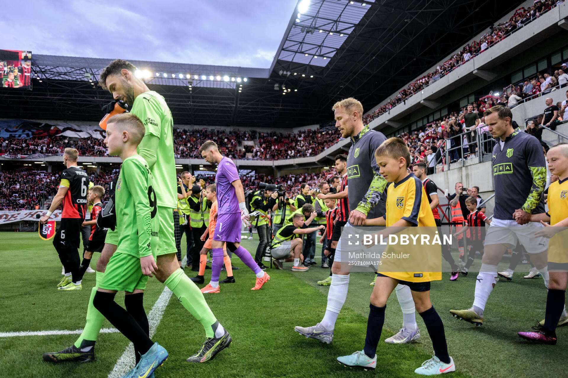 Goalkeeper Etrit Berisha and Mikkel Rygaard Jensen of