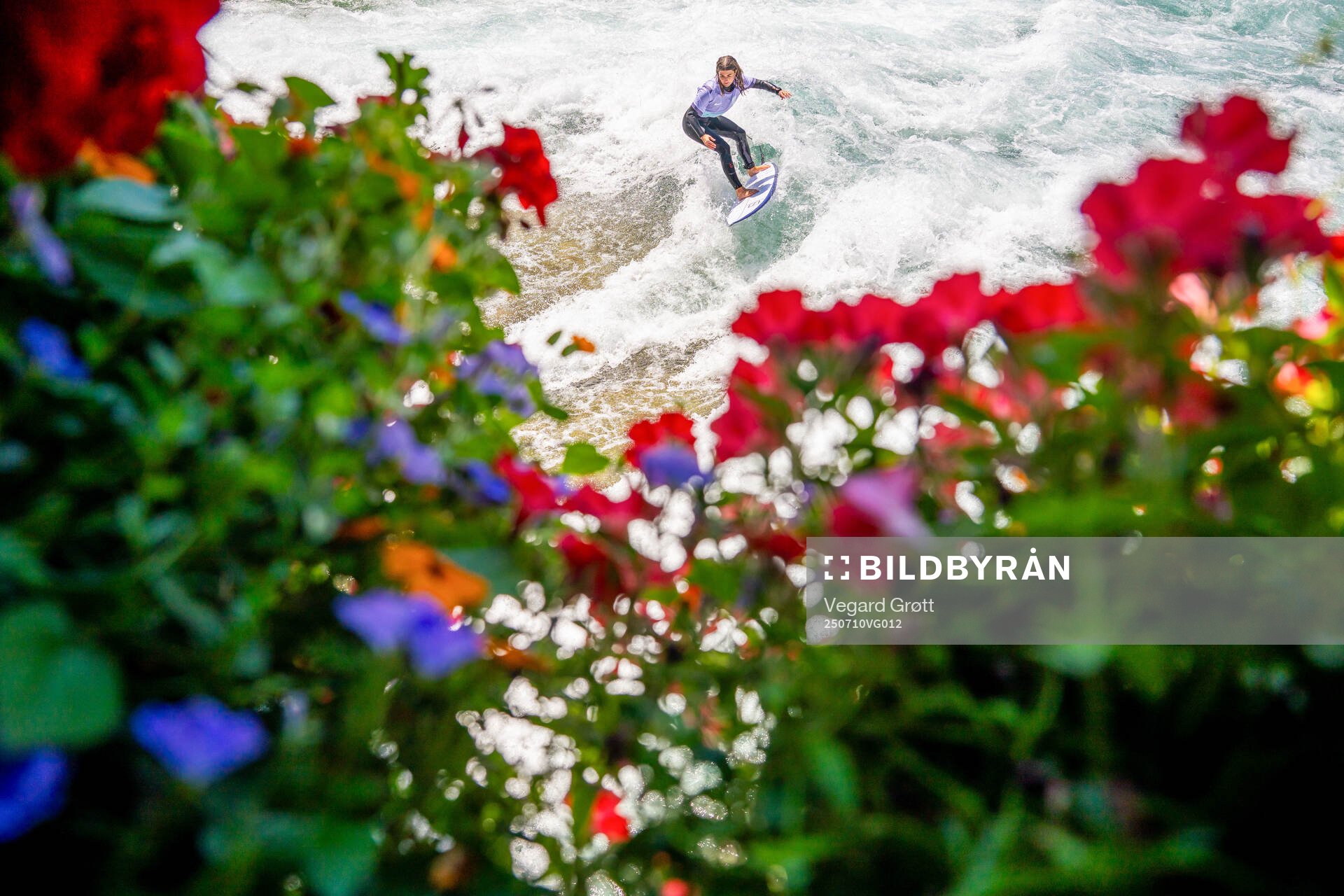 A surfer with the Norwegian away kit