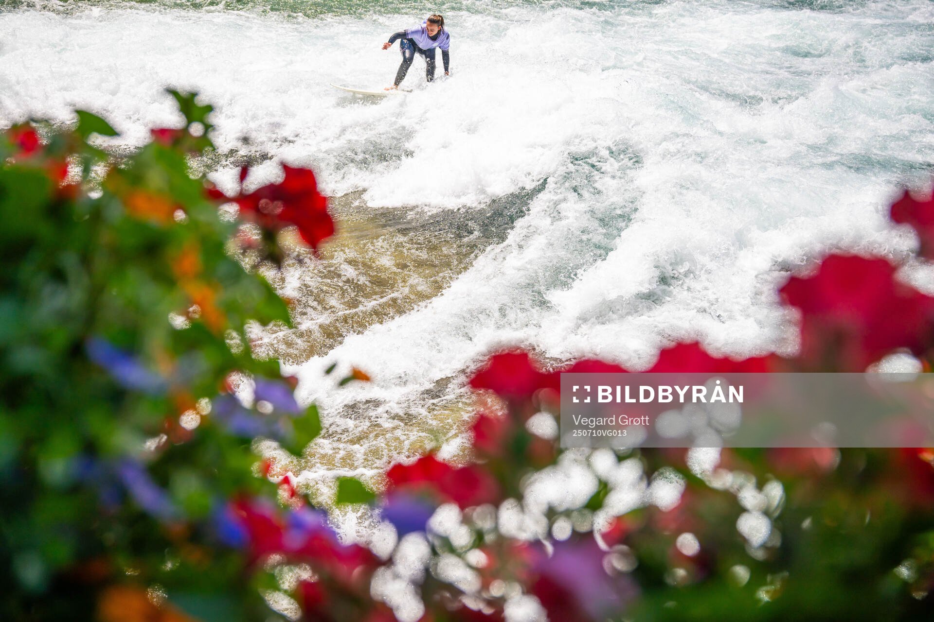 A surfer with the Norwegian away kit