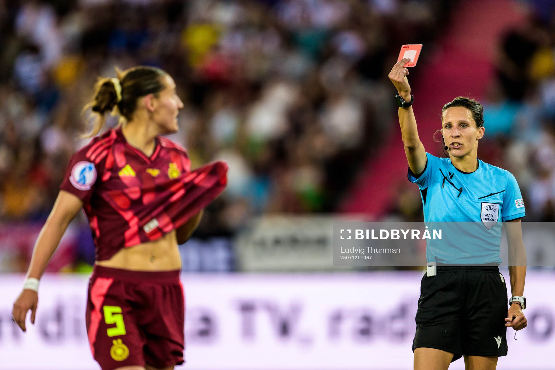 Carlotta Wamser of Germany is shown a red card from Referee