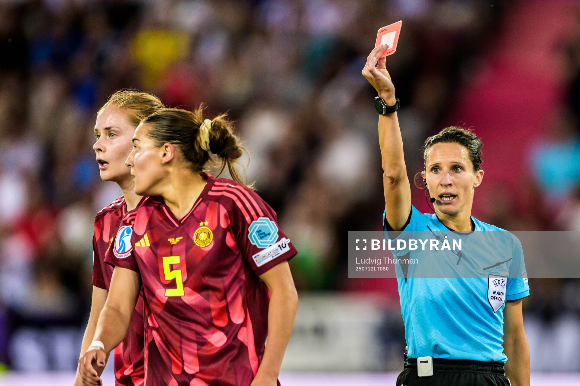 Carlotta Wamser of Germany is shown a red card from Referee
