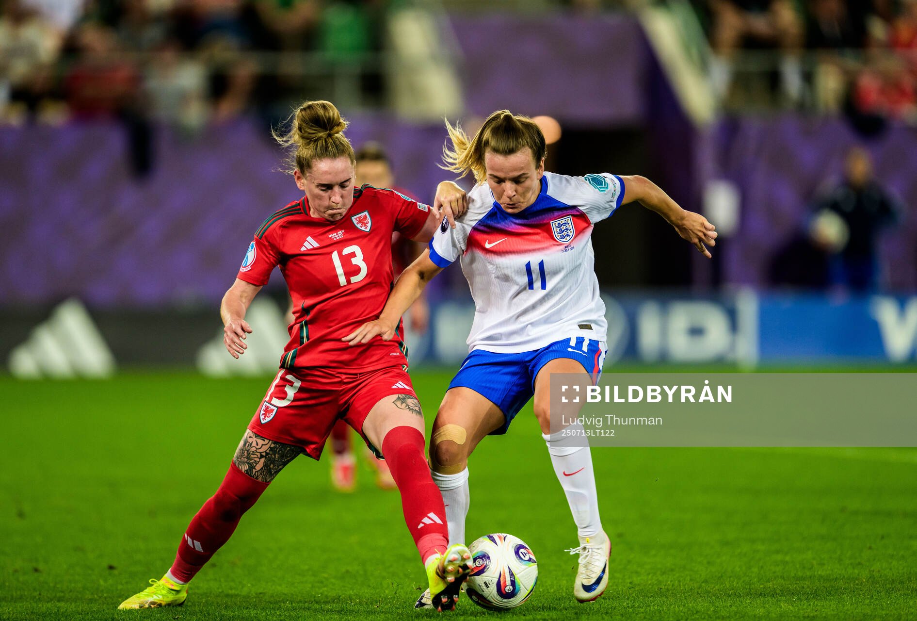 Rachel Rowe of Wales and Lauren Hemp of England
