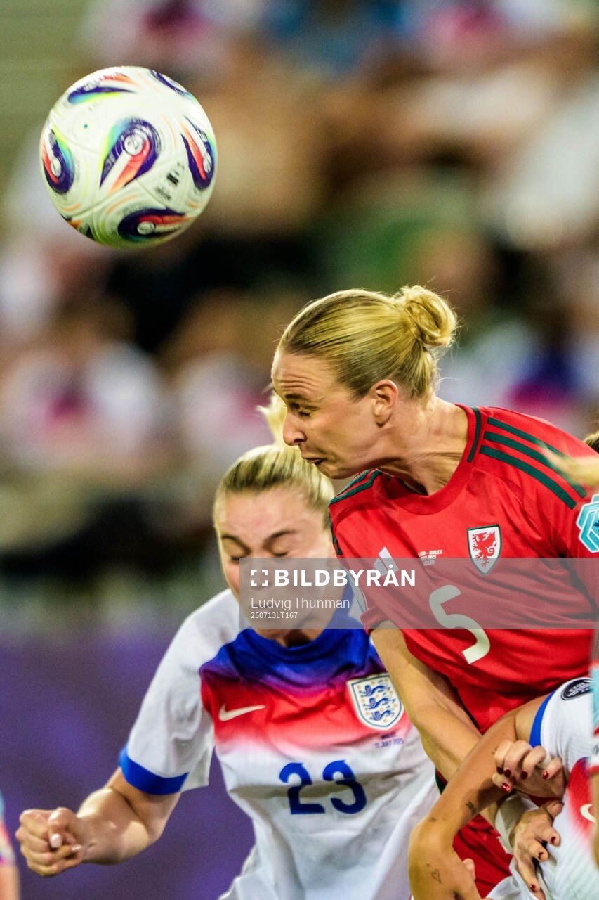Alessia Russo of England and Rhiannon Roberts of Wales