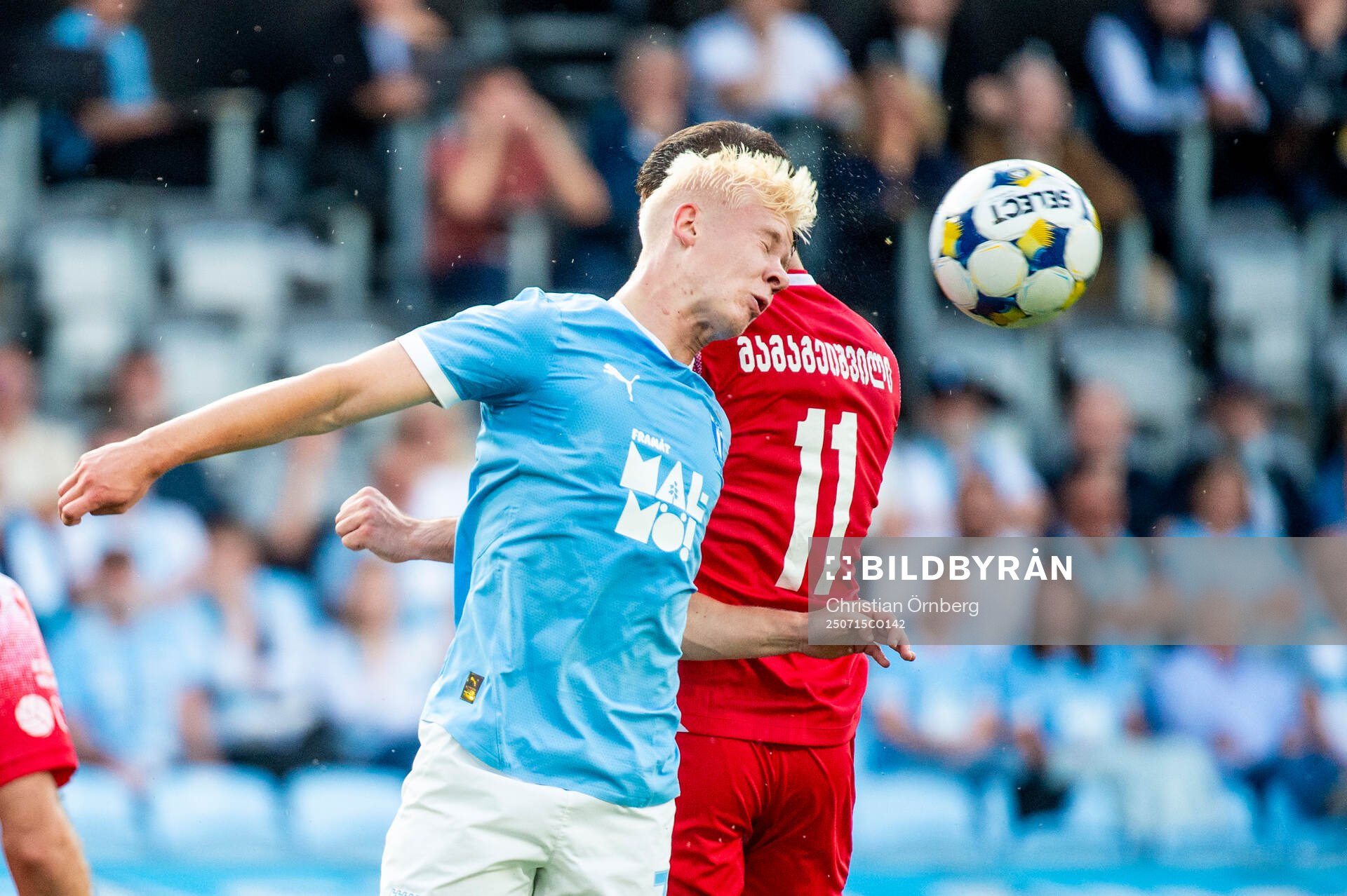 Otto Rosengren of Malmö FF and Gizo Mamageishvili of FC
