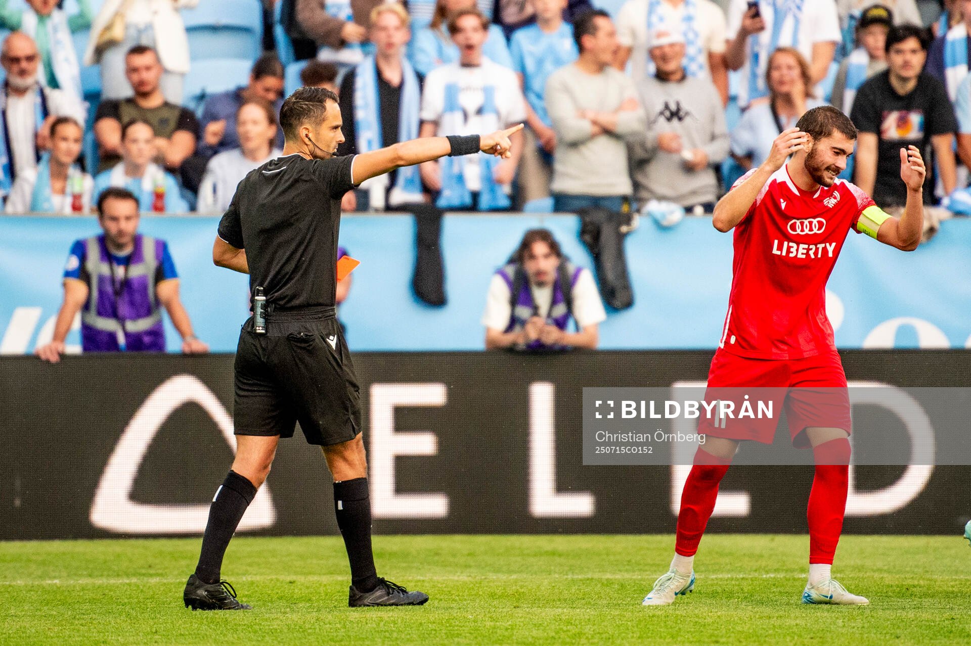 Gizo Mamageishvili of FC Iberia is shown a red card from
