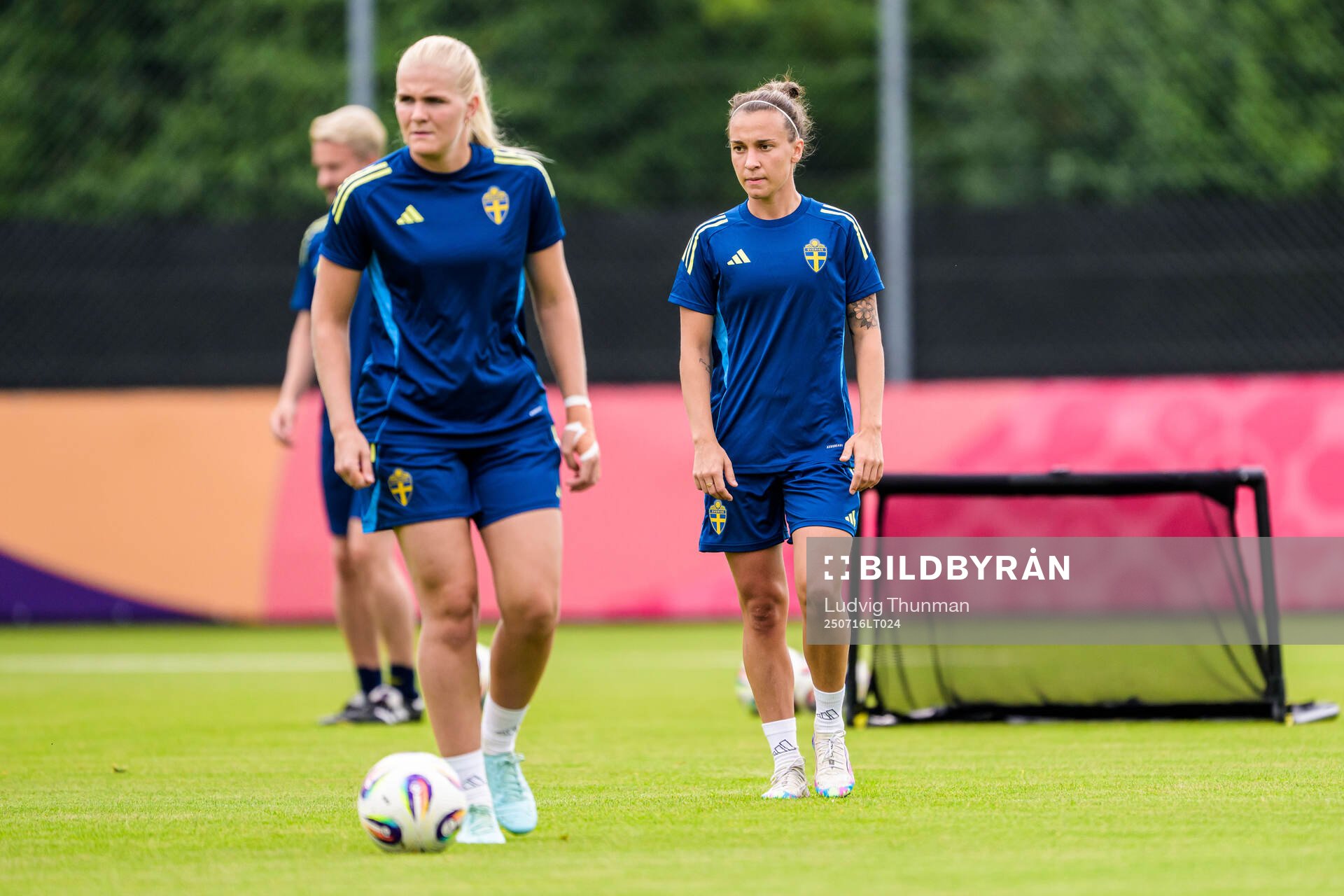 Goalkeeper Emma Holmgren and Julia Zigiotti Olme of the