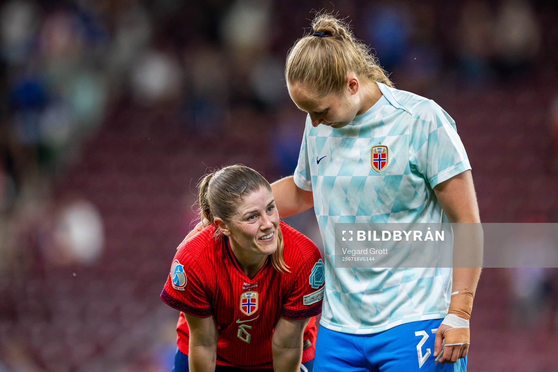Maren Mjelde and goalkeeper Aurora Mikalsen of Norway look