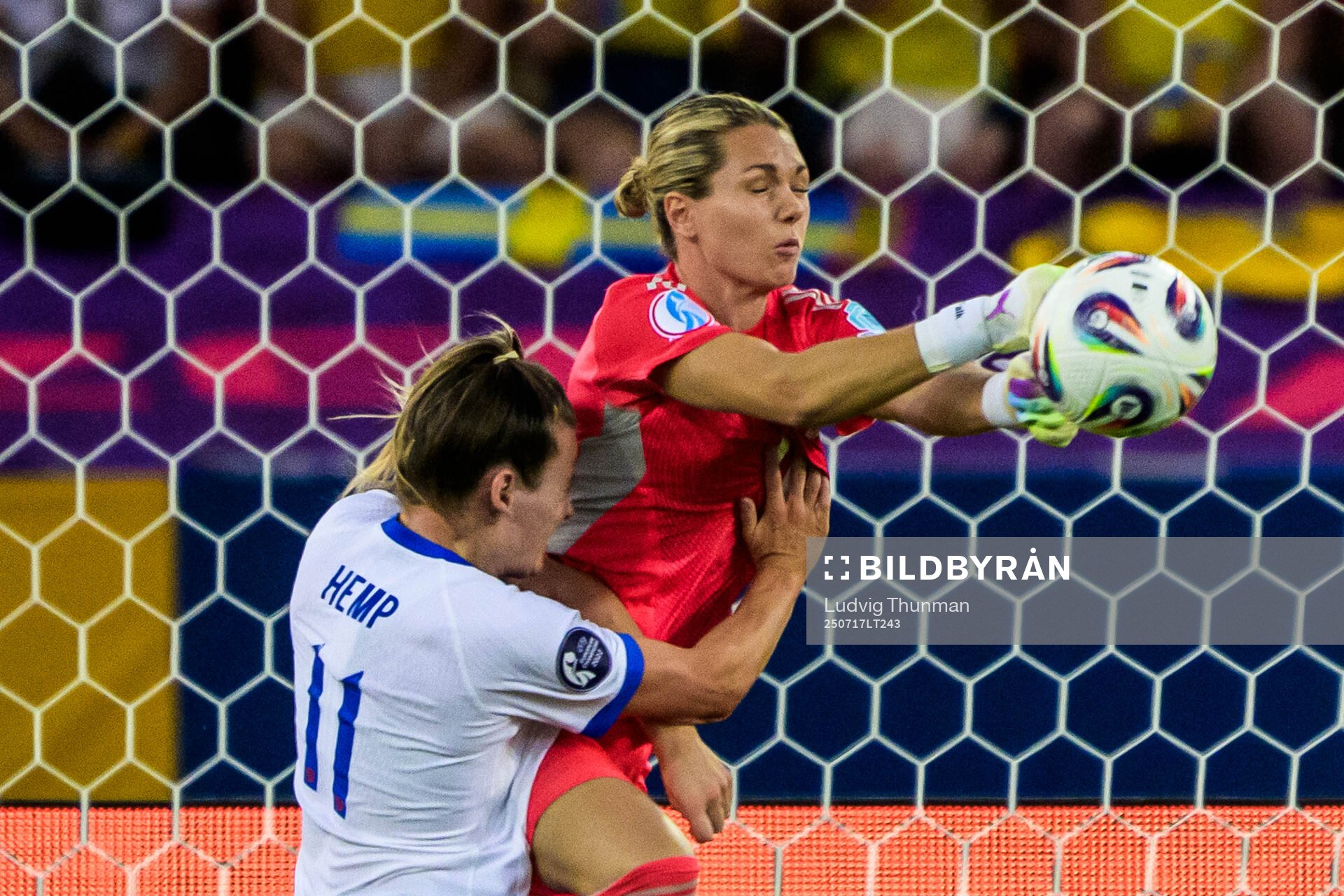 Goalkeeper Jennifer Falk of Sweden and Lauren Hemp of