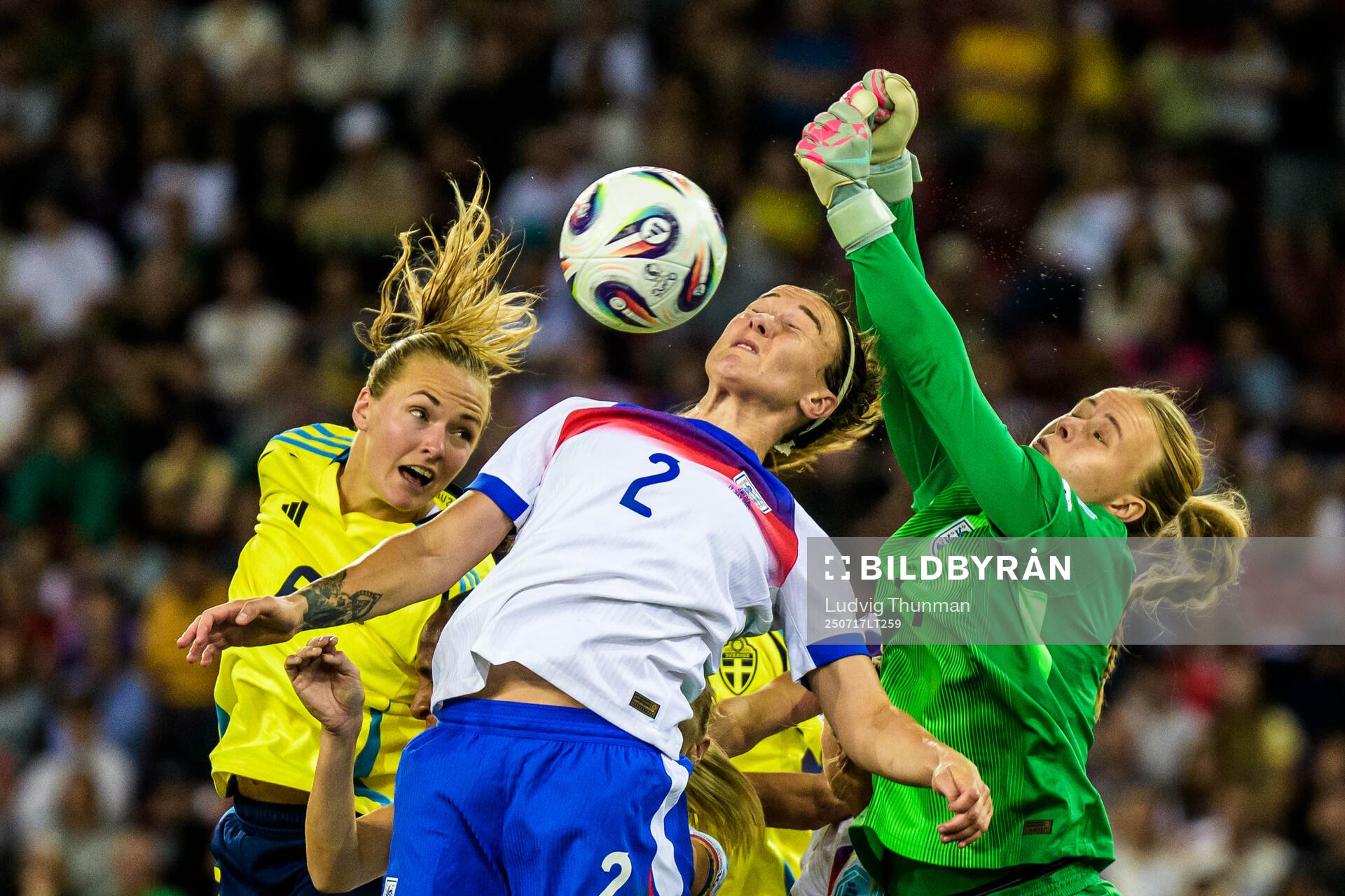 Magdalena Eriksson of Sweden and Lucy Bronze and goalkeeper