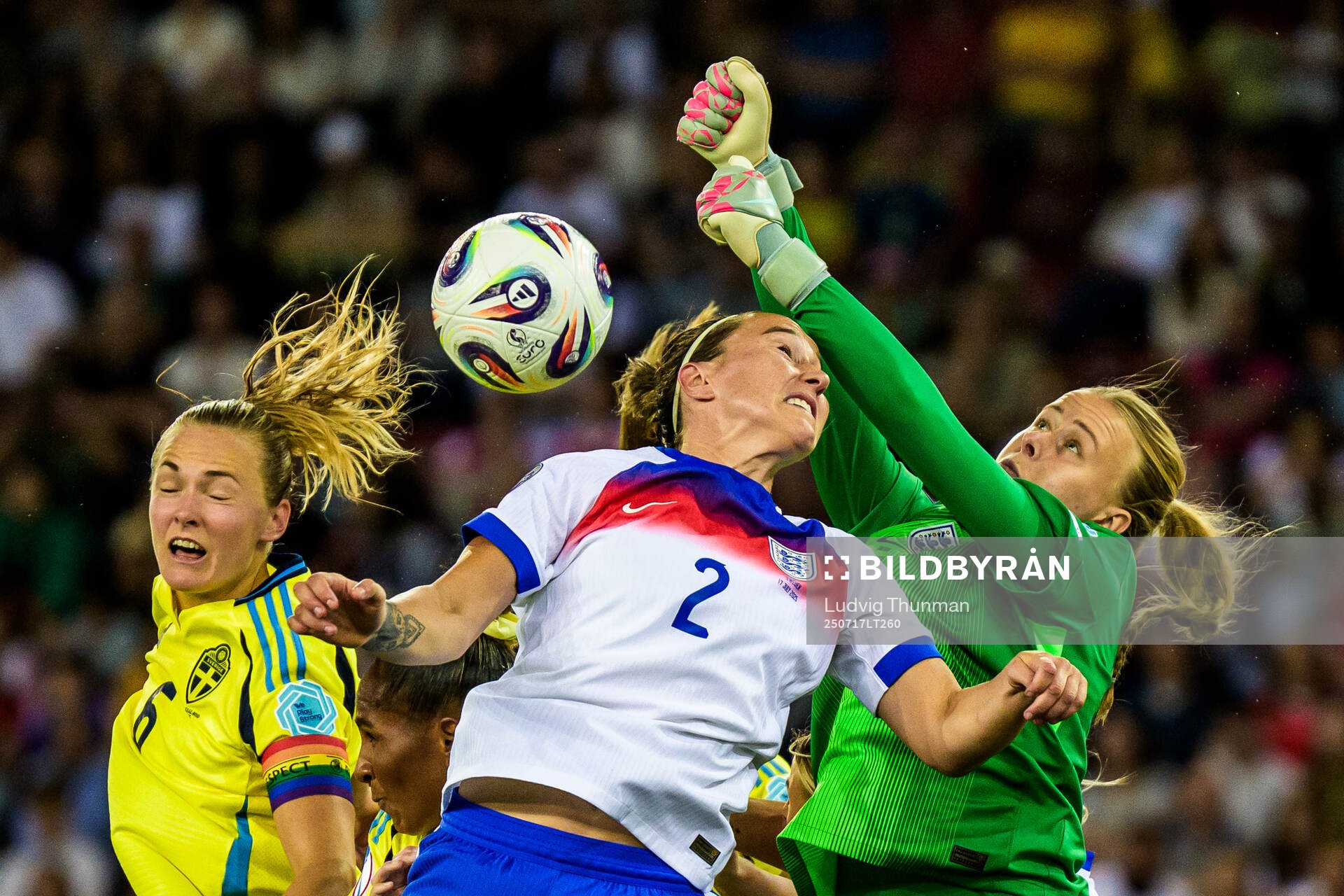 Magdalena Eriksson of Sweden and Lucy Bronze and goalkeeper