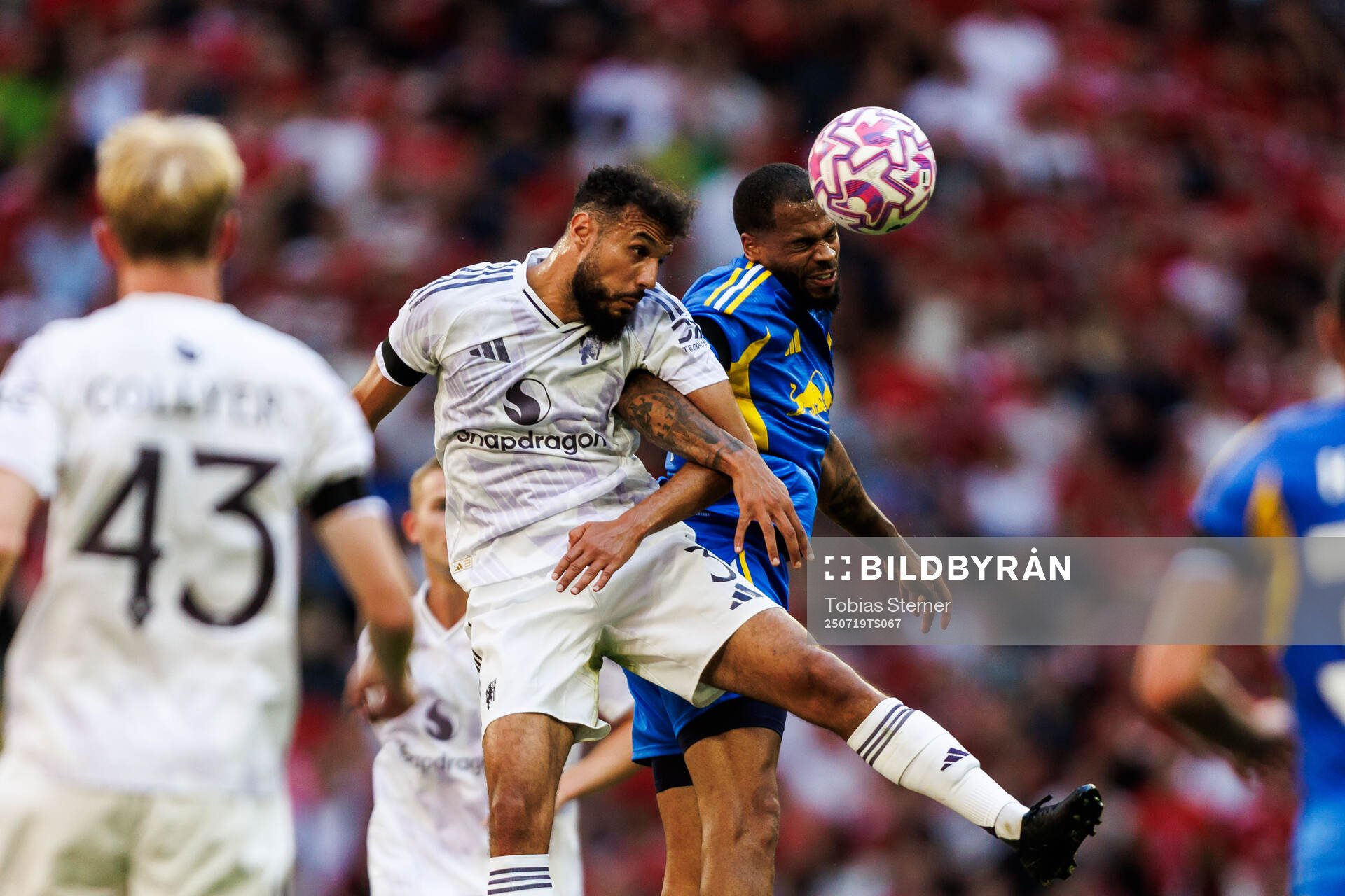 Noussair Mazraoui of Manchester United and Lukas Nmecha of