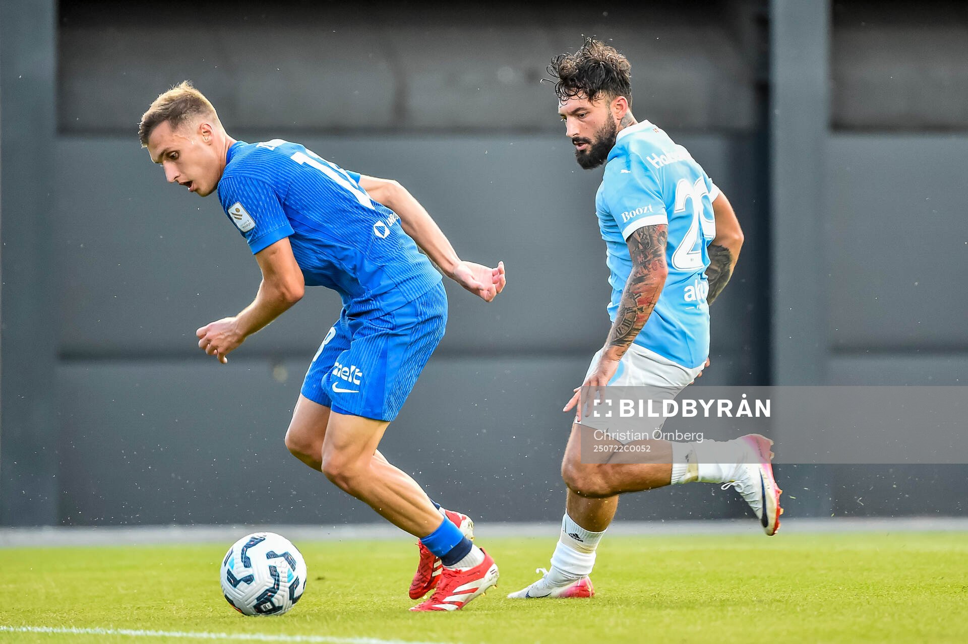 Dmitrijs Zelenkovs of FK RFS and Sead Haksabanovic of