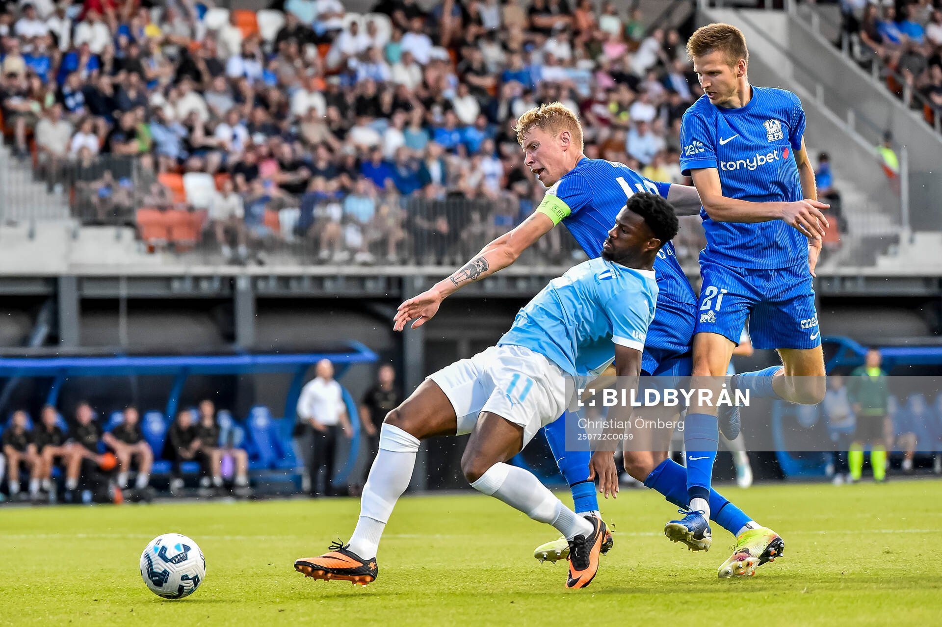 Emmanuel Ekong of Malmö FF and Ziga Lipuscek and Elvis