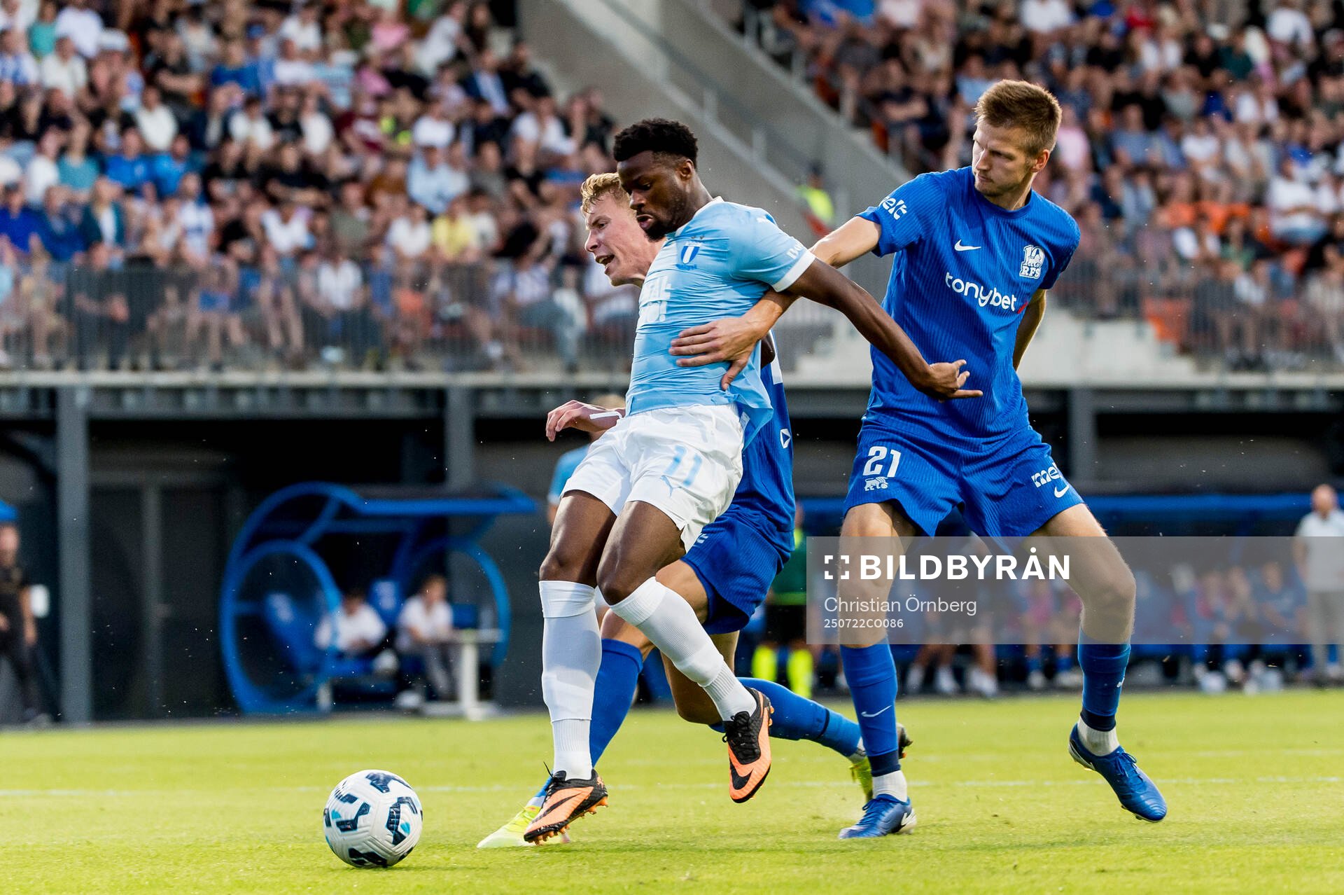 Emmanuel Ekong of Malmö FF and Ziga Lipuscek and Elvis