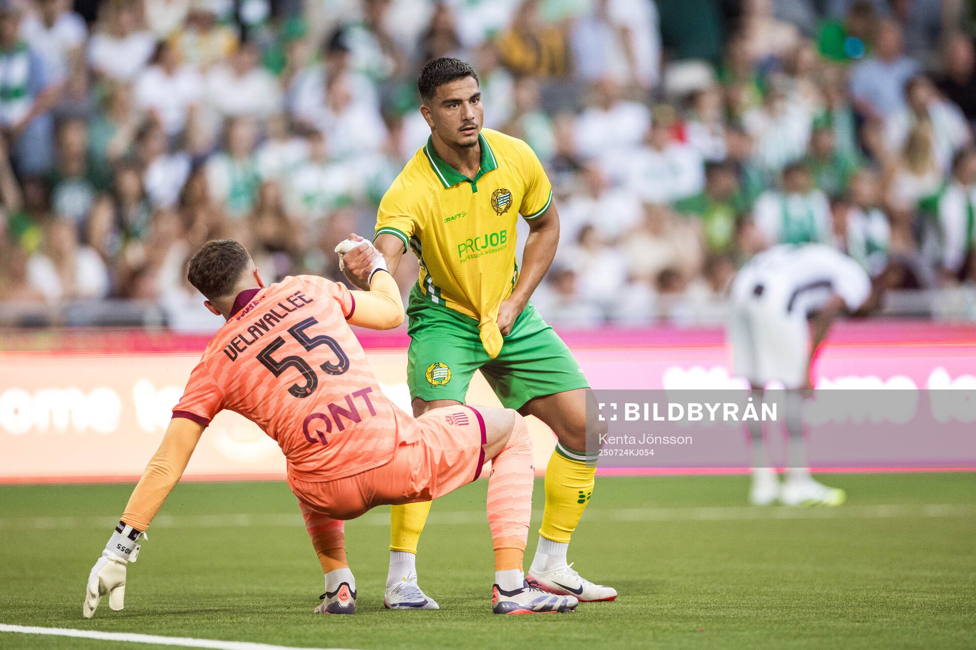 Jusef Erabi of Hammarby and goalkeeper Martin Delavallee of