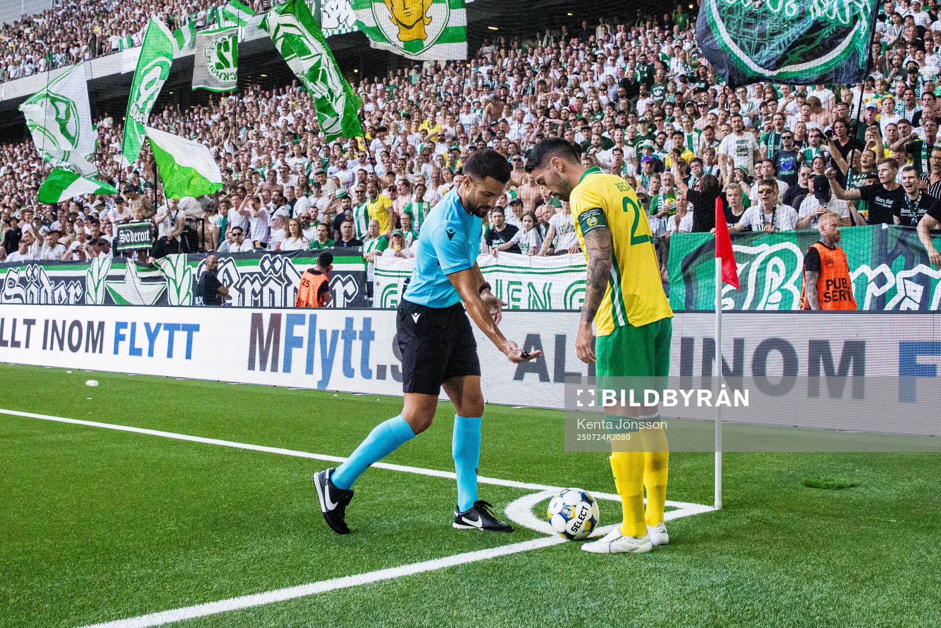 Referee Mathieu Vernice and Nahir Besara of Hammarby