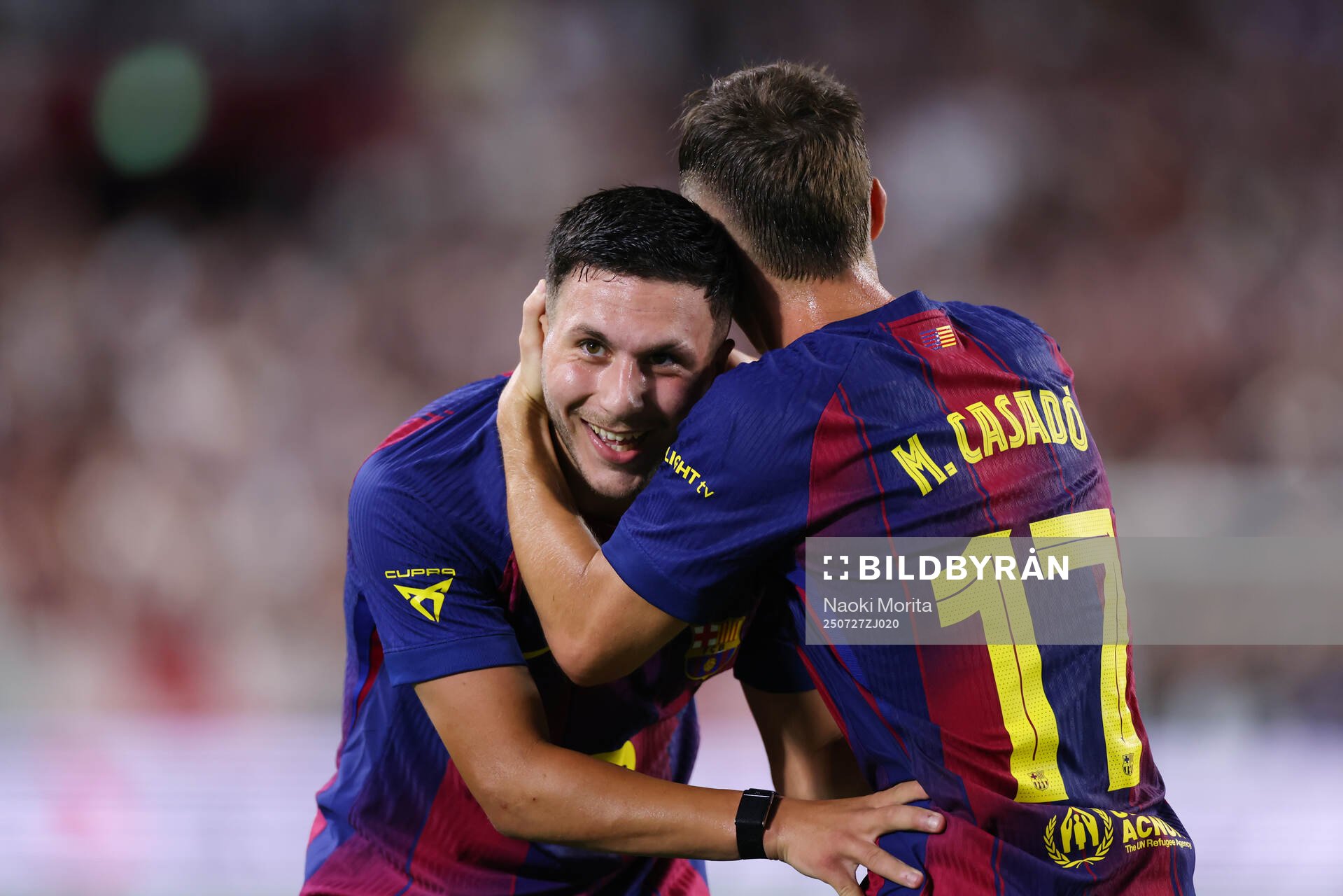 Roony Bardghji and Marc Casado of Barcelona celebrates
