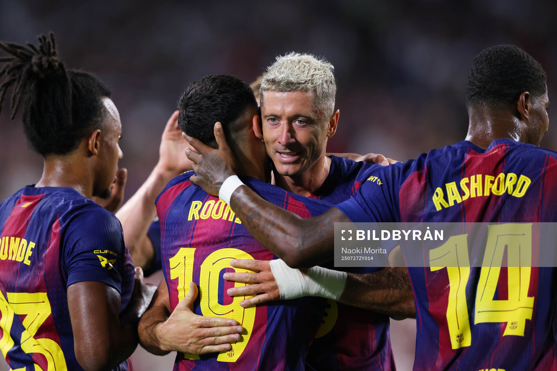Roony Bardghji and Robert Lewandowski of Barcelona