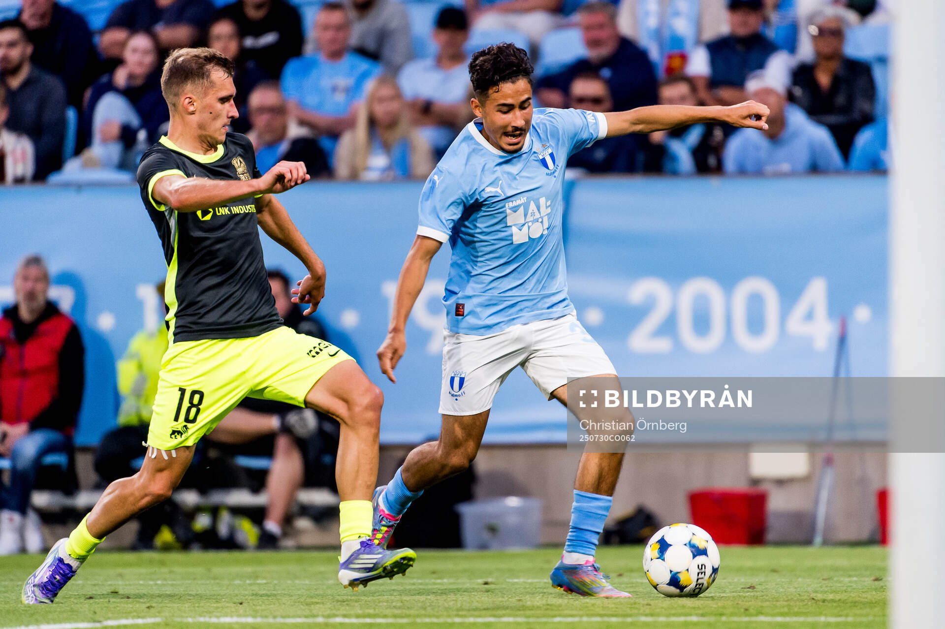 Dmitrijs Zelenkovs of FK RFS and Adrian Skogmar of Malmö FF