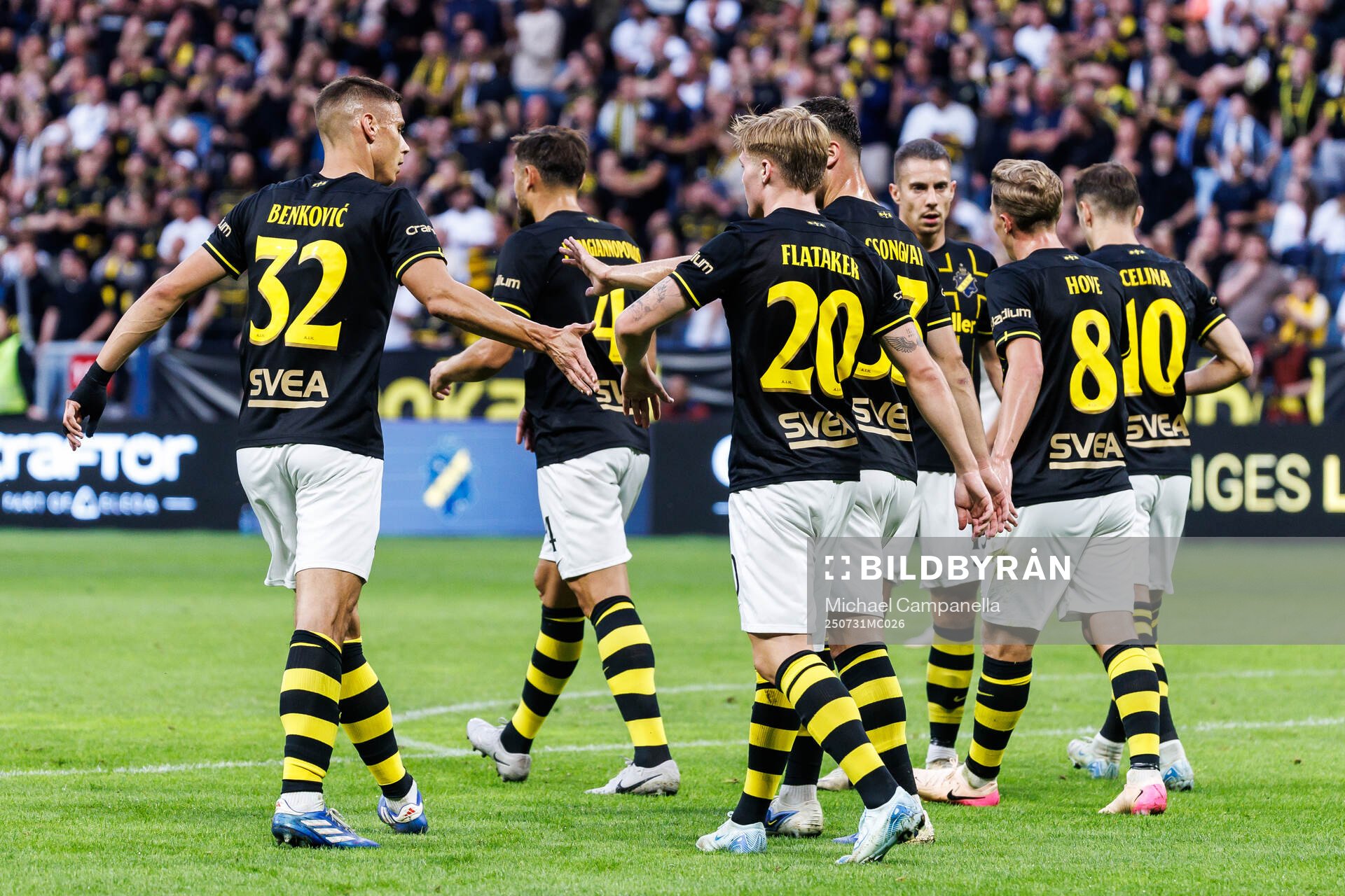 Erik Hovden Flataker of AIK celebrate with team mates