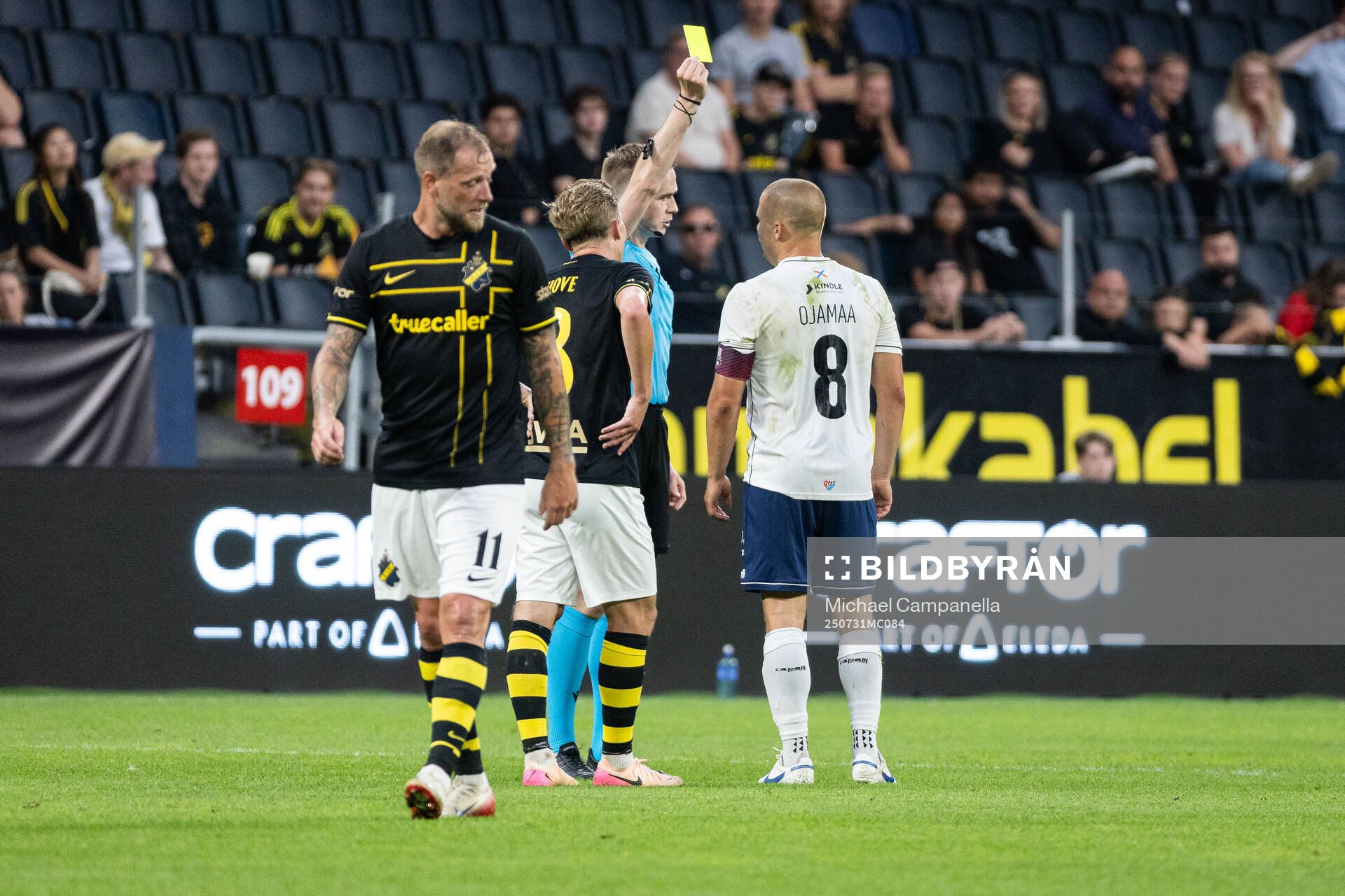 Henrik Ojamaa of Paide Linnameeskond is shown a yellow card