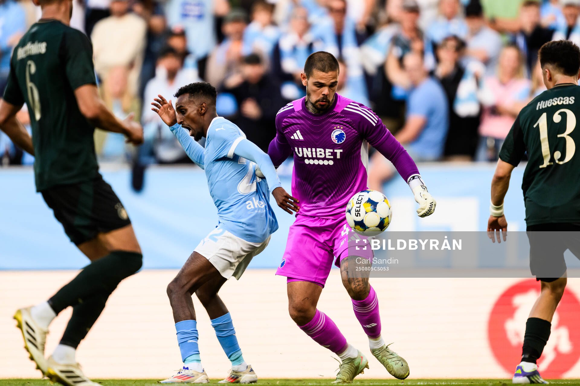 Taha Ali of Malmö FF and goalkeeper Dominik Kotarski of FC
