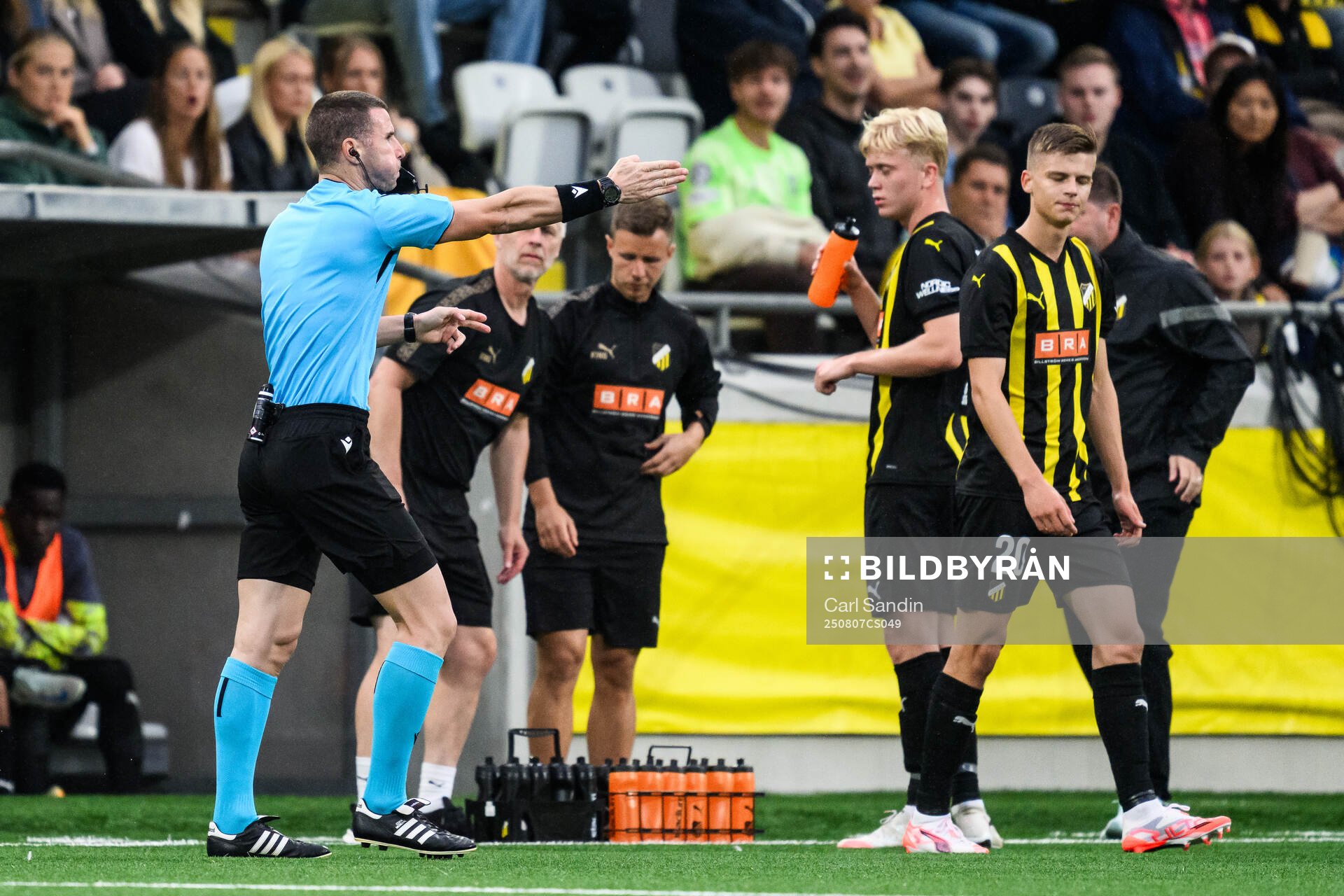 Referee Georgi Kabakov points to the penalty point