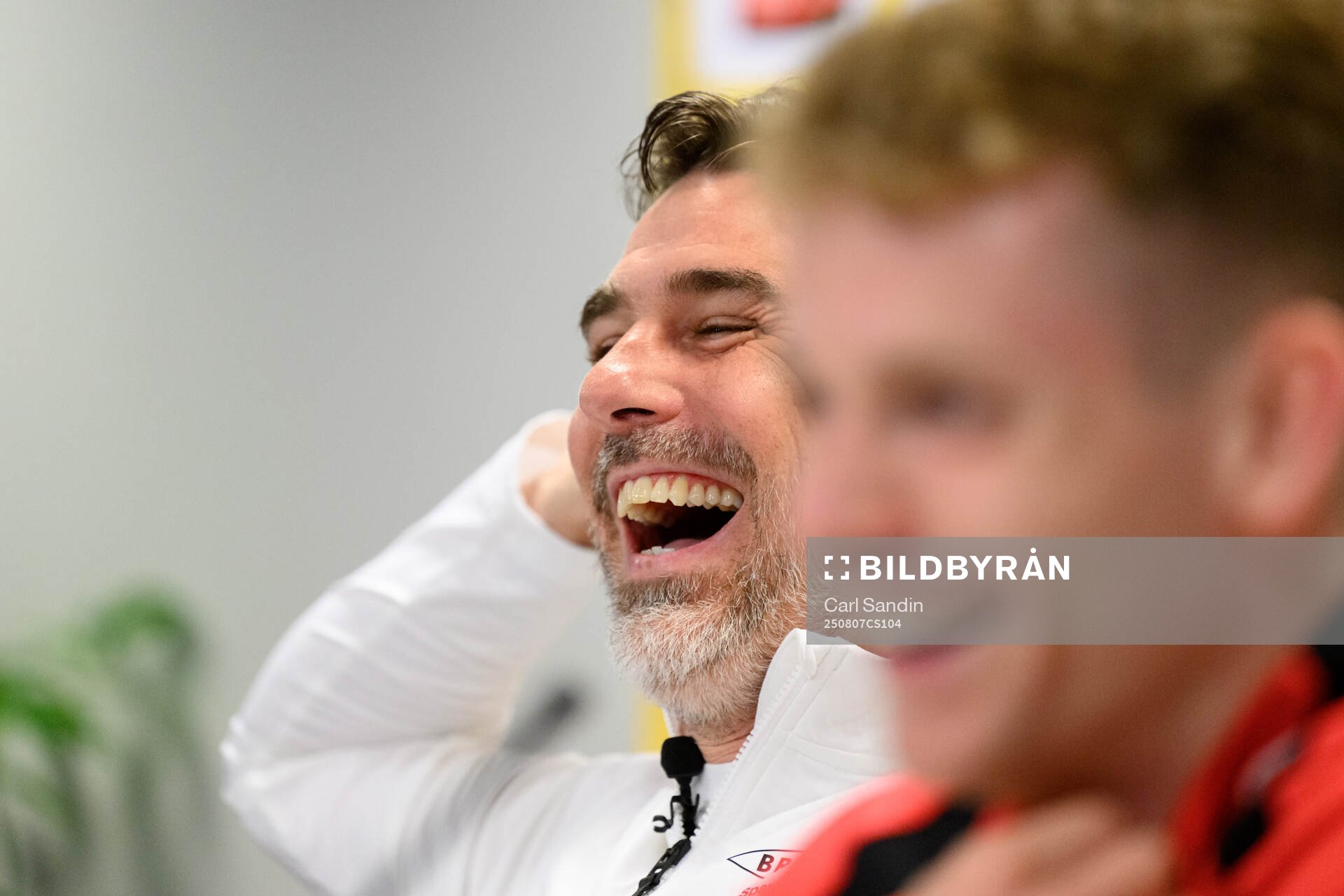 Coach Freyr Alexandersson at a press conference