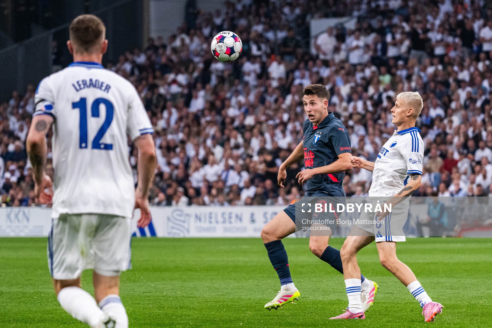 Lasse Berg Johnsen of Malmö FF and Magnus Mattsson of FC